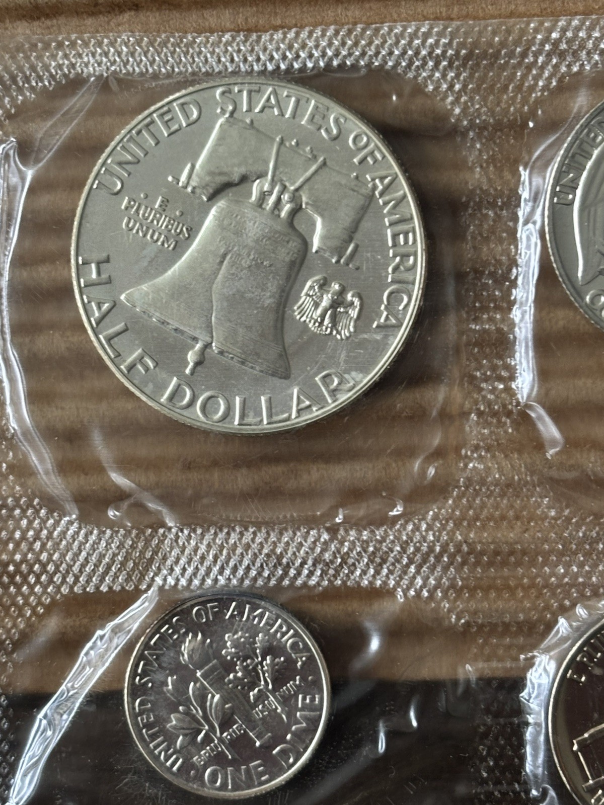 1957 U.S. PROOF SET. Coins U.S. Mint Sealed in a flat cello. (Tear in envelope)