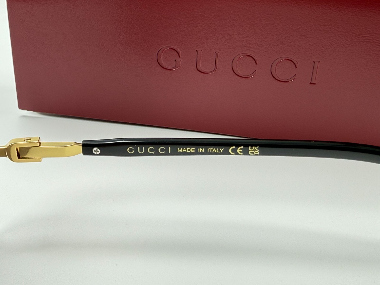 Gucci GG1221S 001 Black Gold Rimless Sunglasses Gray Lens 56mm