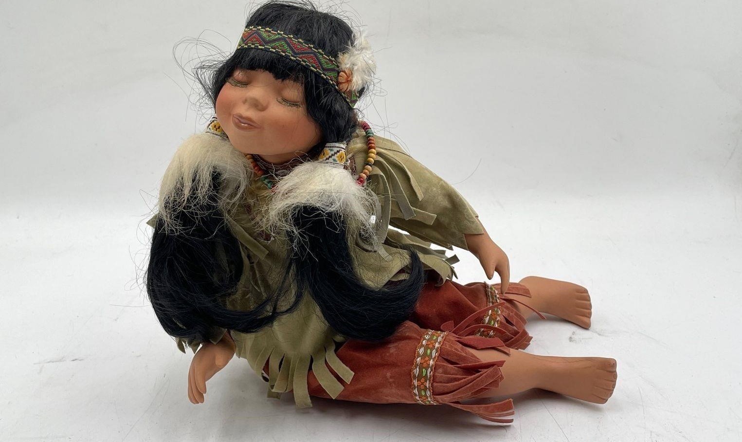 Vintage Native American Girl Doll in Kissing Expression Closed Eyes Sitting Pose
