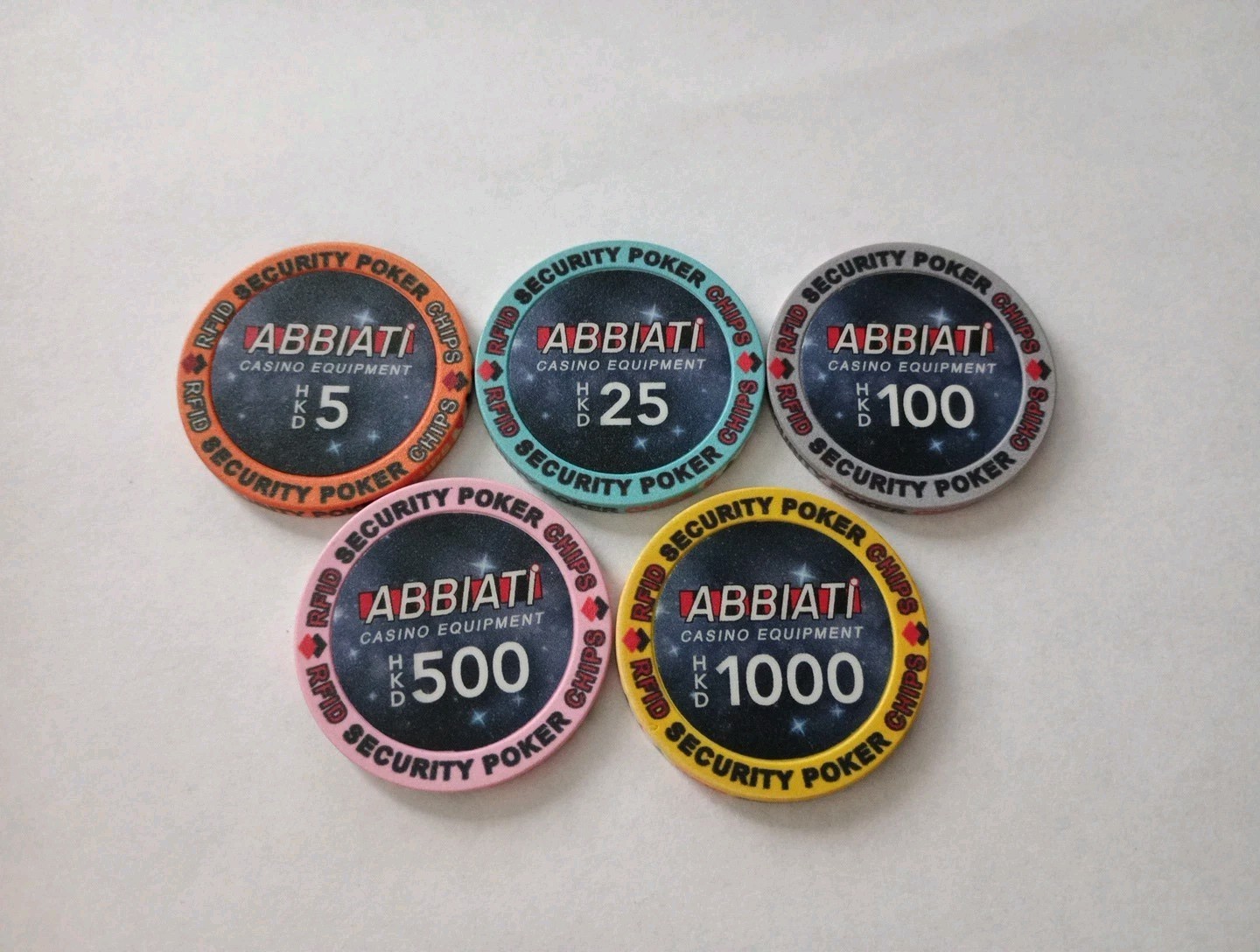 ABBIATI CASINO EQUIPMENT CHIP COMPANY SET OF 5 CHIPS GREAT FOR COLLECTION NEW!