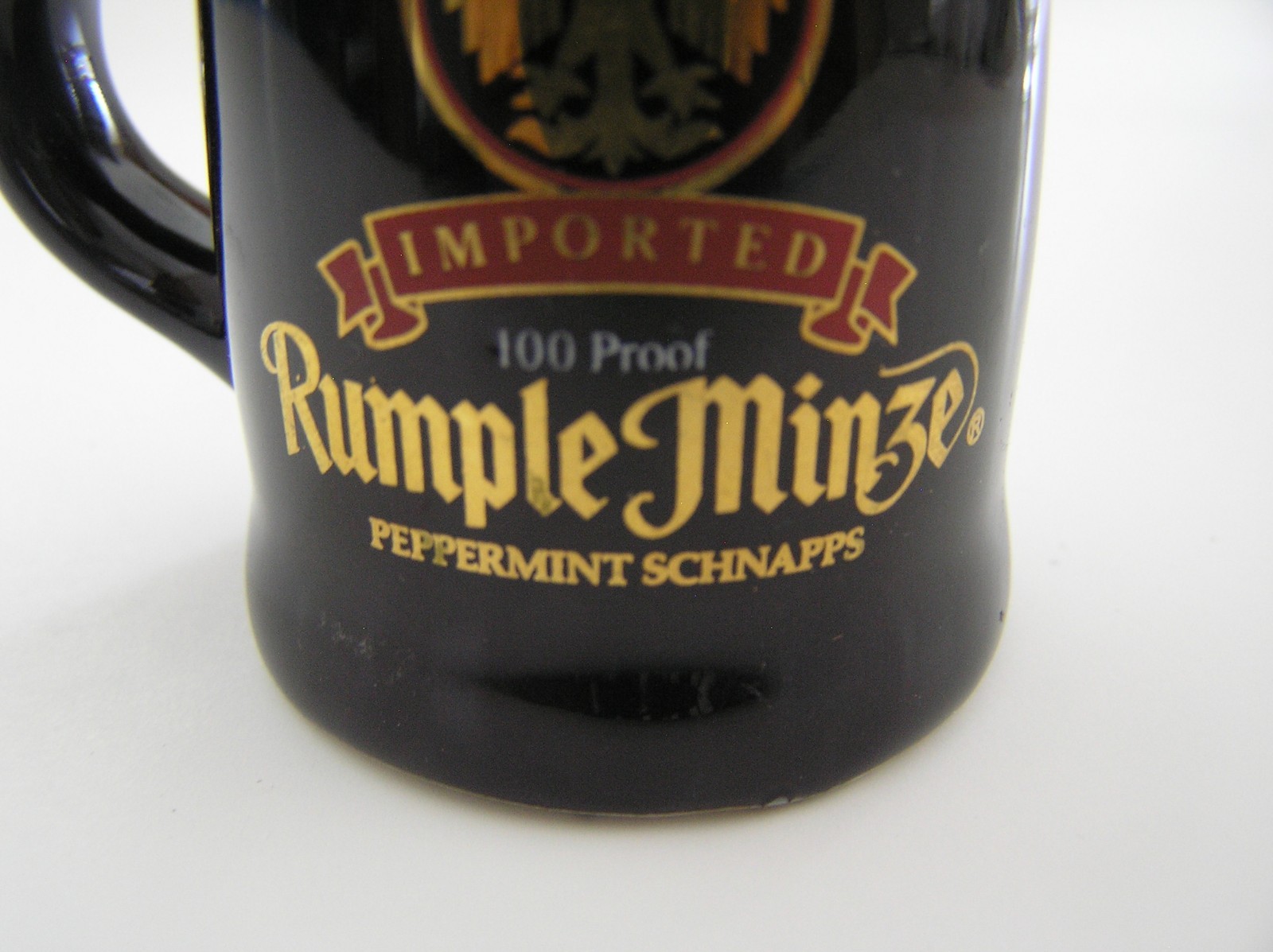 2 Souvenirs Shot Mugs: A Black Rumple Minze and A Clear Nashville 5cents Beer