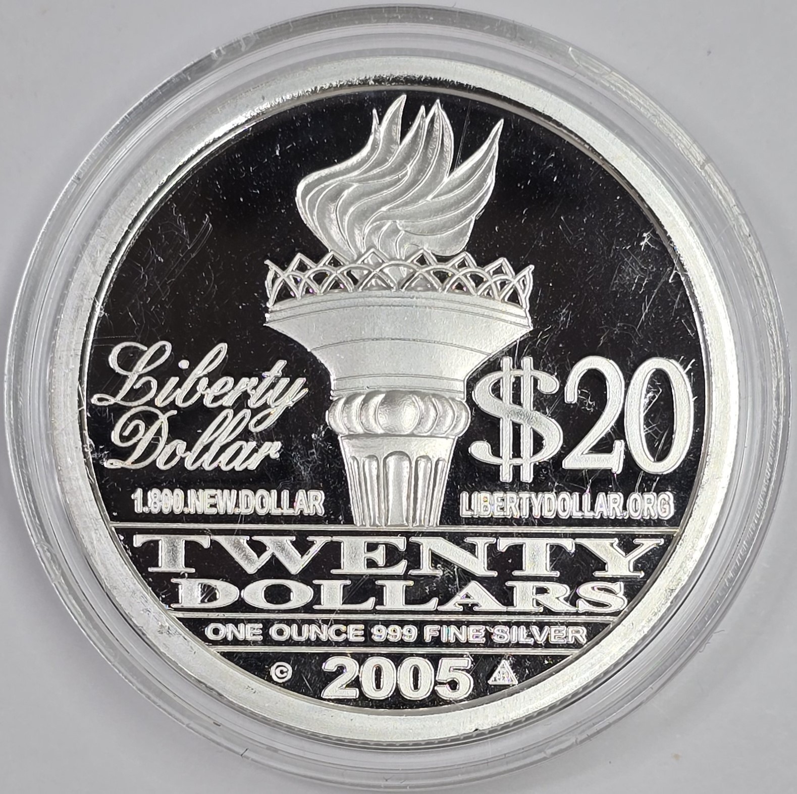 2005 1oz .999 Silver Proof $20 Norfed Liberty Coin in a Capsule GEM BU