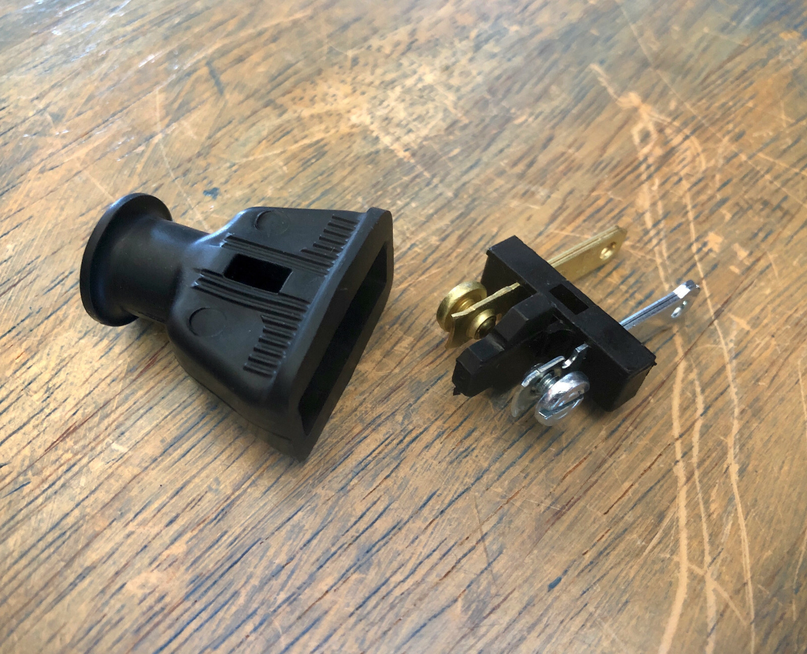 2 Prong Electrical Plug - Black rubber shell, polarized male plug connector