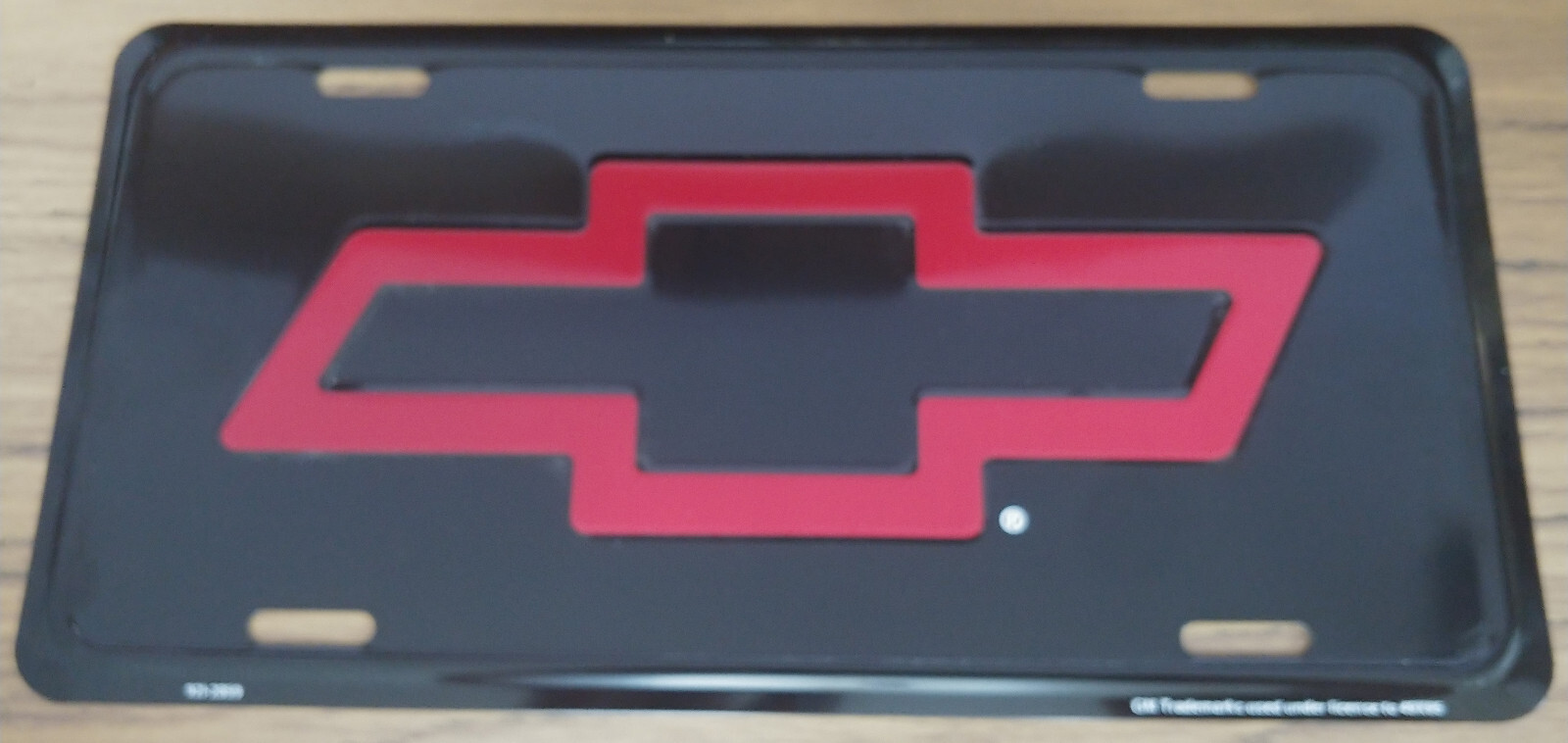 Vintage Chevy License Plate Red Bowtie Bow-Tie Embossed Auto Tag Metal Old Stock