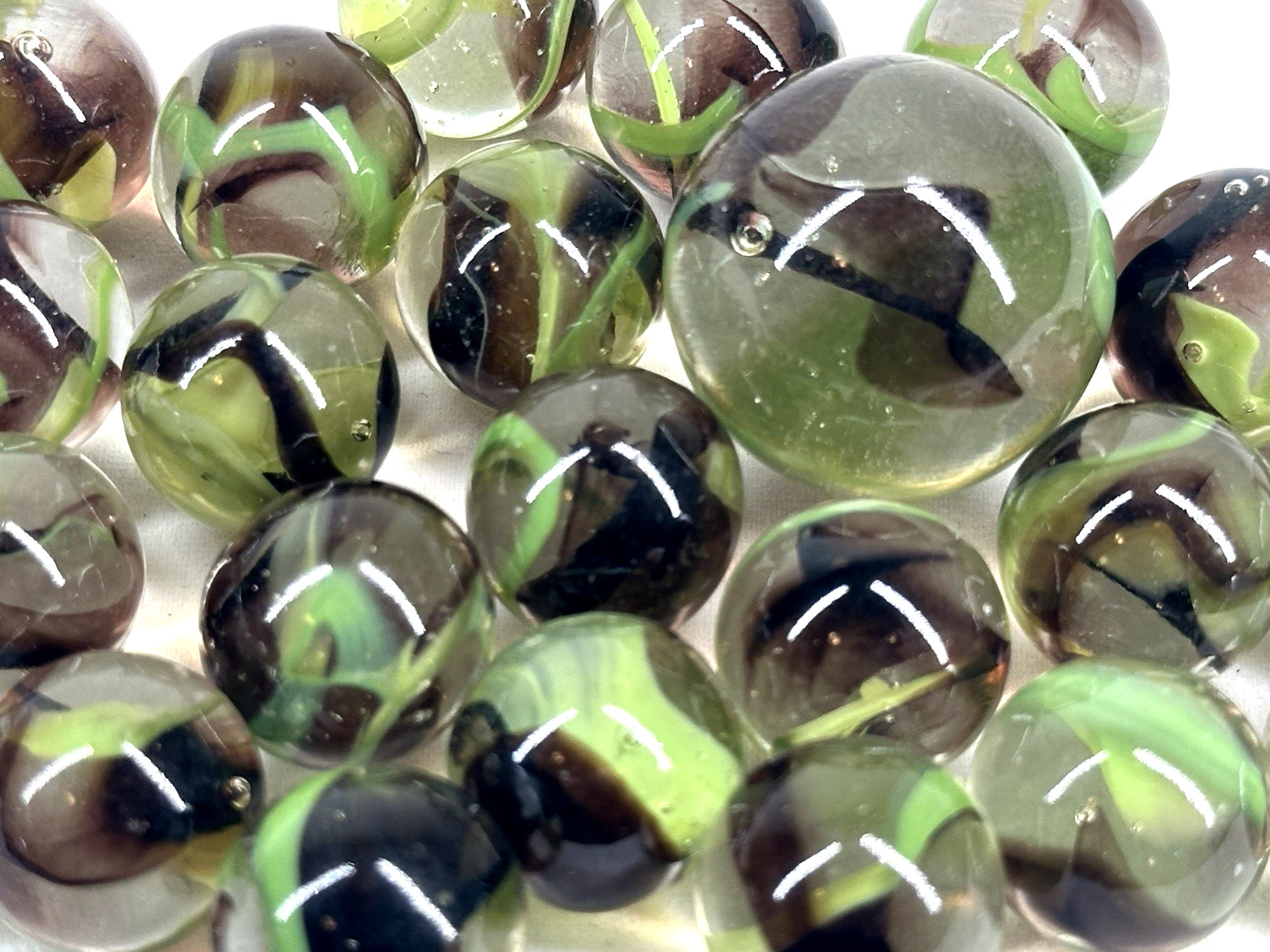 25 Glass Marbles BIGFOOT Clear/Green/Brown Shooter game Pack Swirl