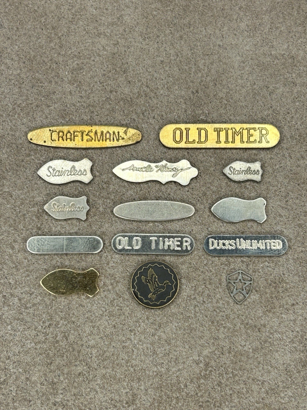 14 Lot Knife Shields/Badges Old Timer, Schrade, Craftsman, Ducks Unlimited, Etc.