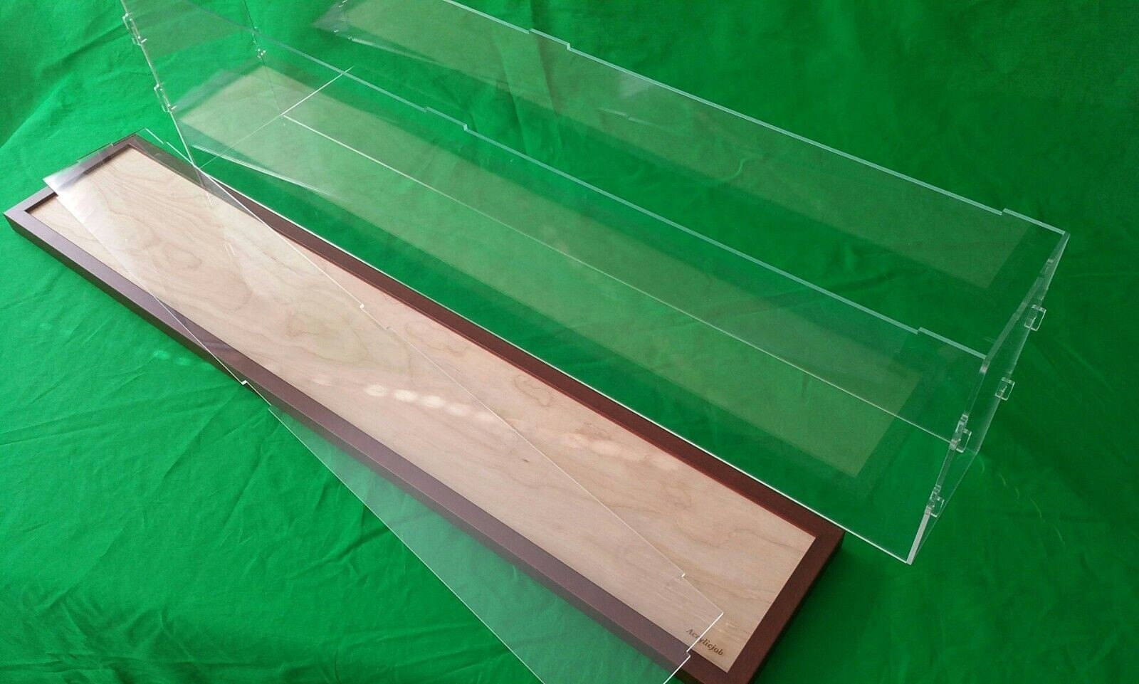 29"L x 11"W x 7"H display case with 3/16" thick acrylic brown wood frame base