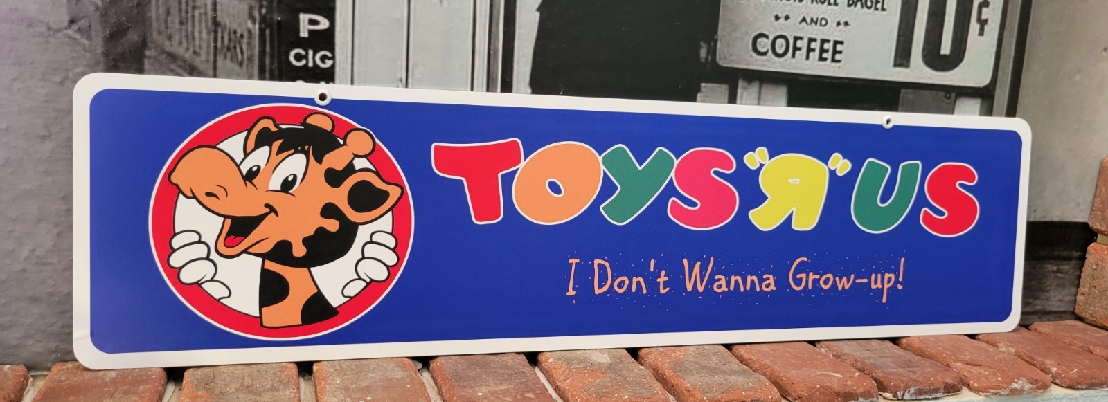Toys R Us aluminum sign  6" x 24"  I Don't Wanna Grow-Up!