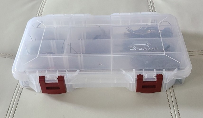 Lot of 11 Spinner and 'Riot" baits with clear Plano Fishing Tackle Box 11”x7”