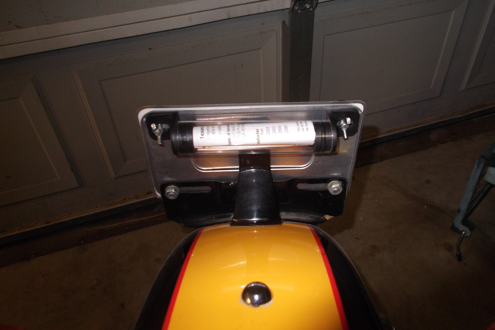 registration holder - stash tube - Harley, Honda, Kawasaki all motorcycles