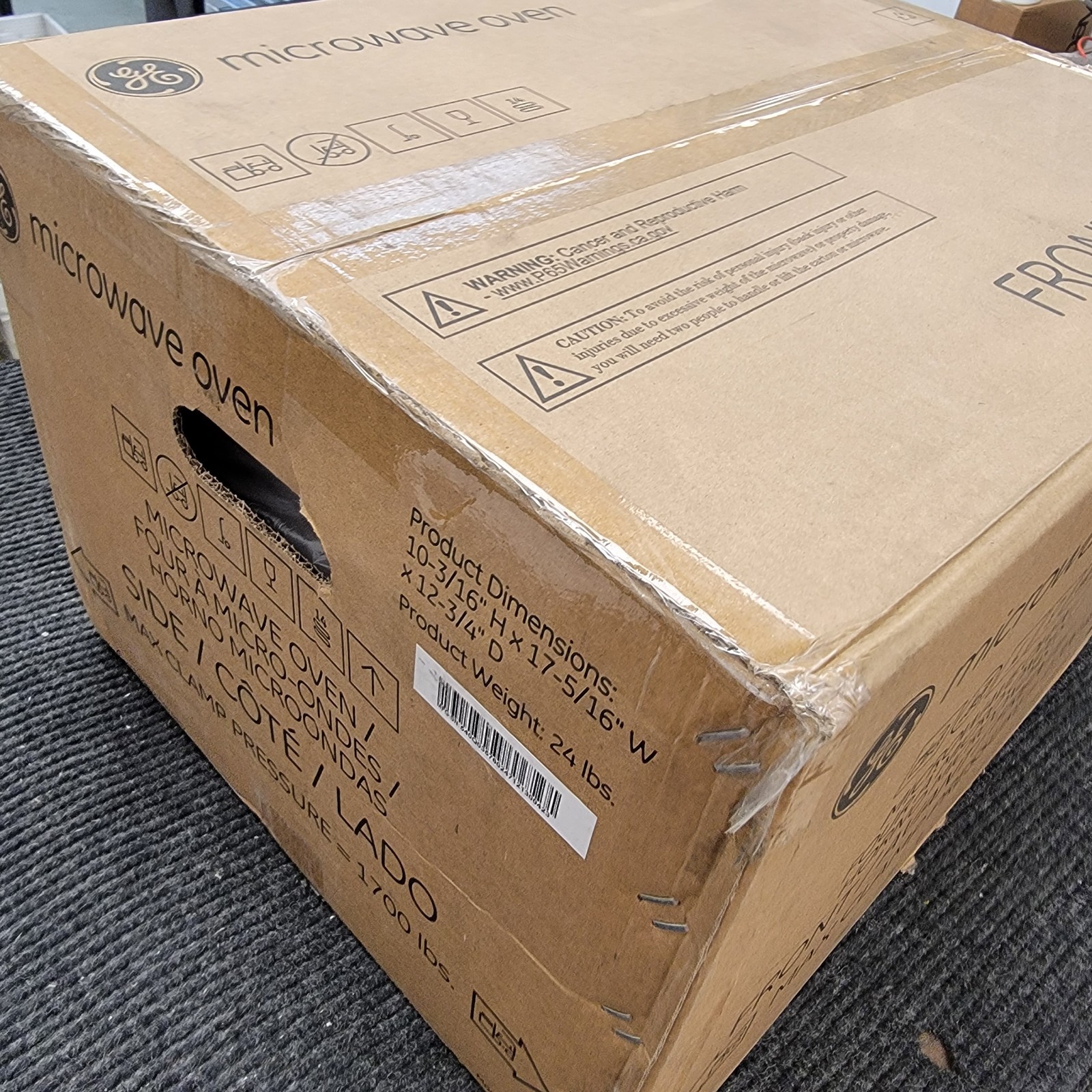 GE 0.7 Cu. Ft. Spacemaker Countertop Microwave Oven | White | GCHK07N1WWW