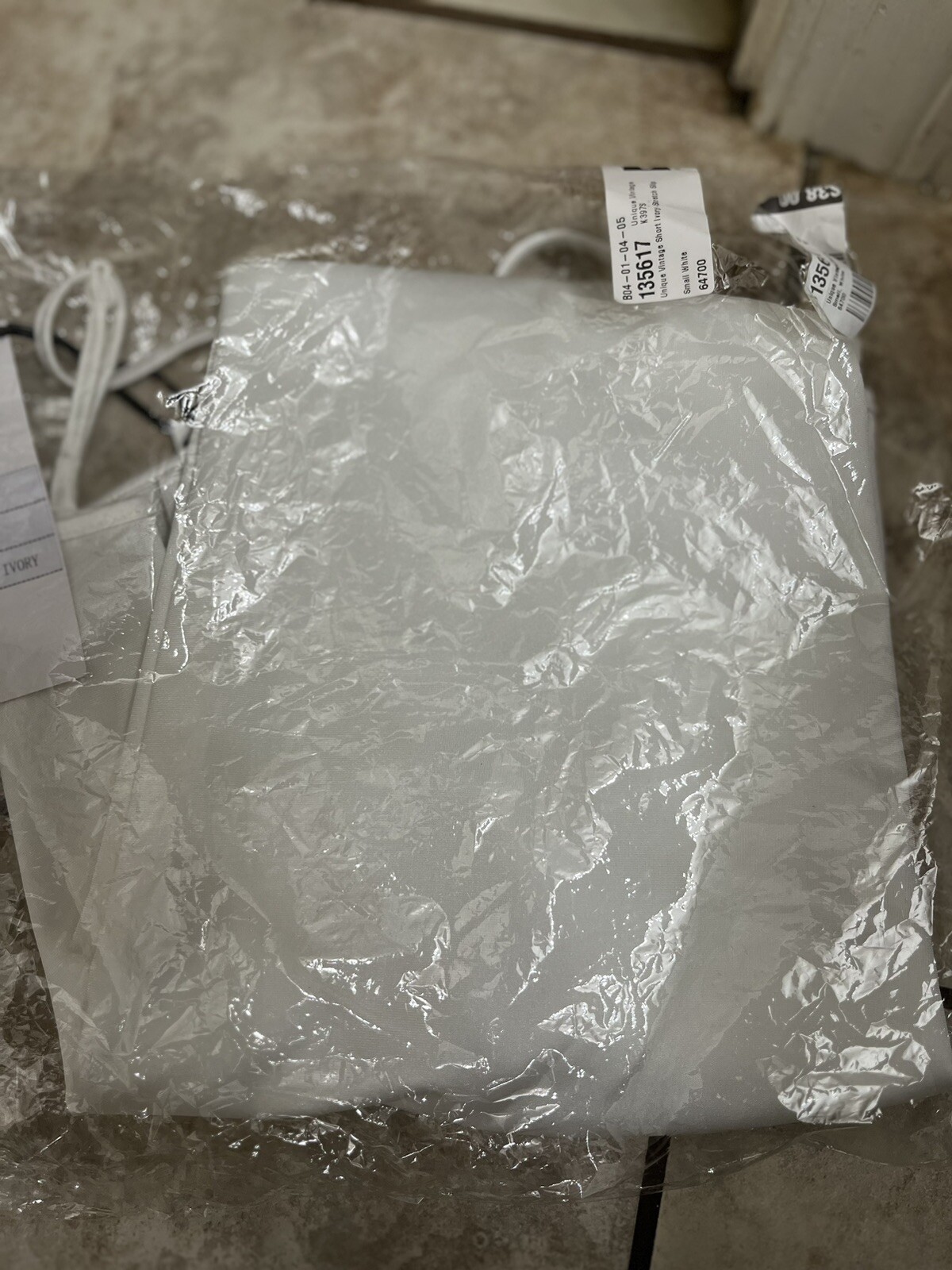 Unique Vintage Short Ivory Stretch Slip - Small NWT