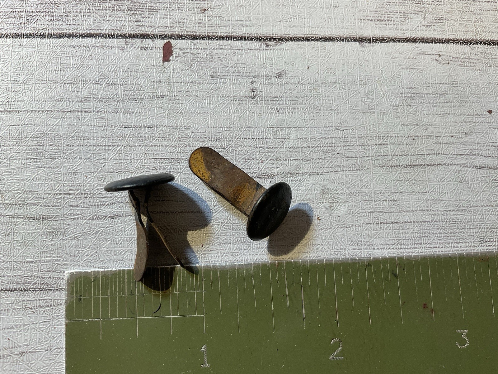 ORIGINAL WWII GERMAN HELMET RIVET PAIR 1943 DATED / Marked