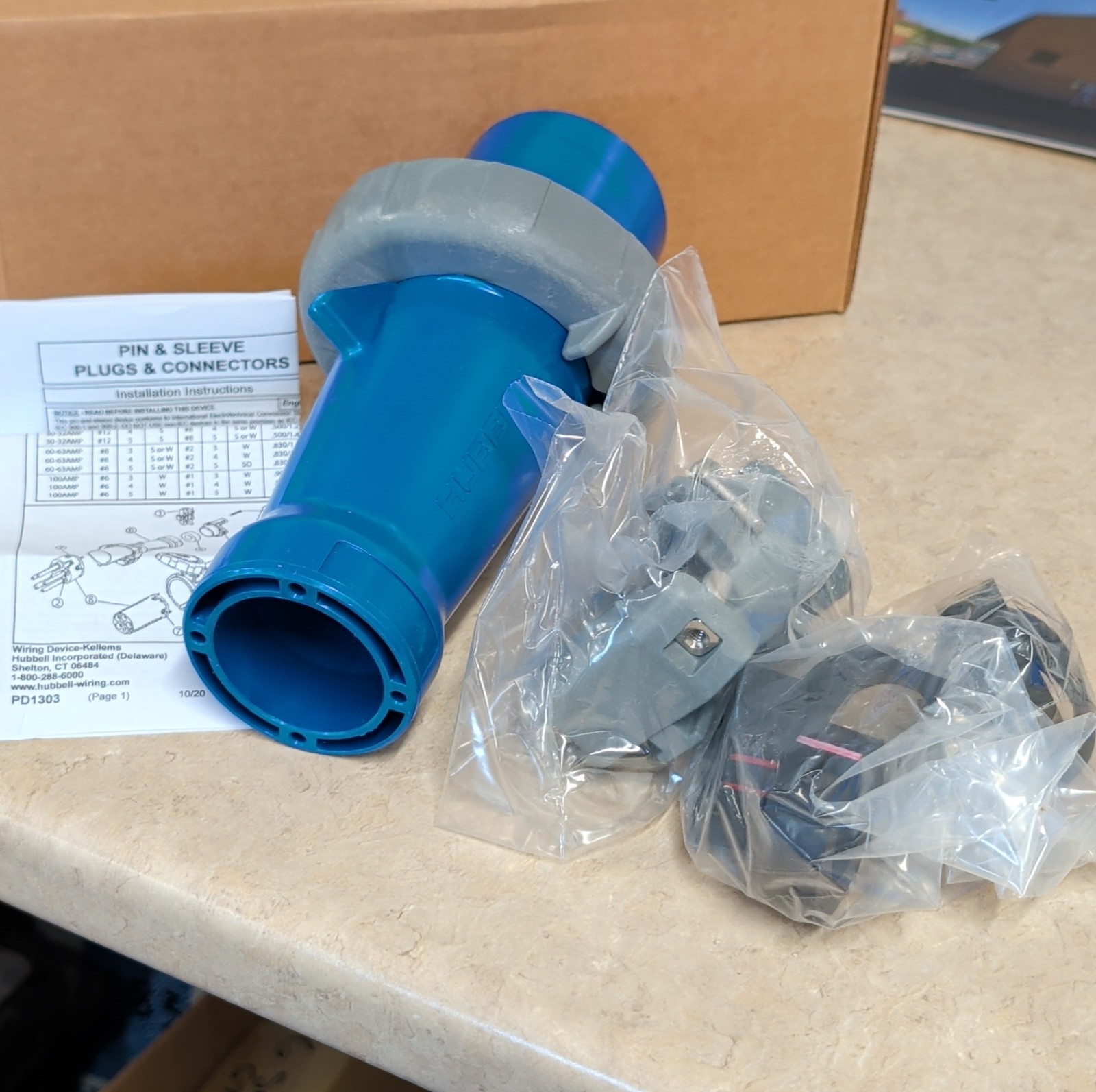 Hubbell HBL460P9W Pin & Sleeve Plug 60A 250V IEC 60309 3P4W IP67 IP69K Blue Gray