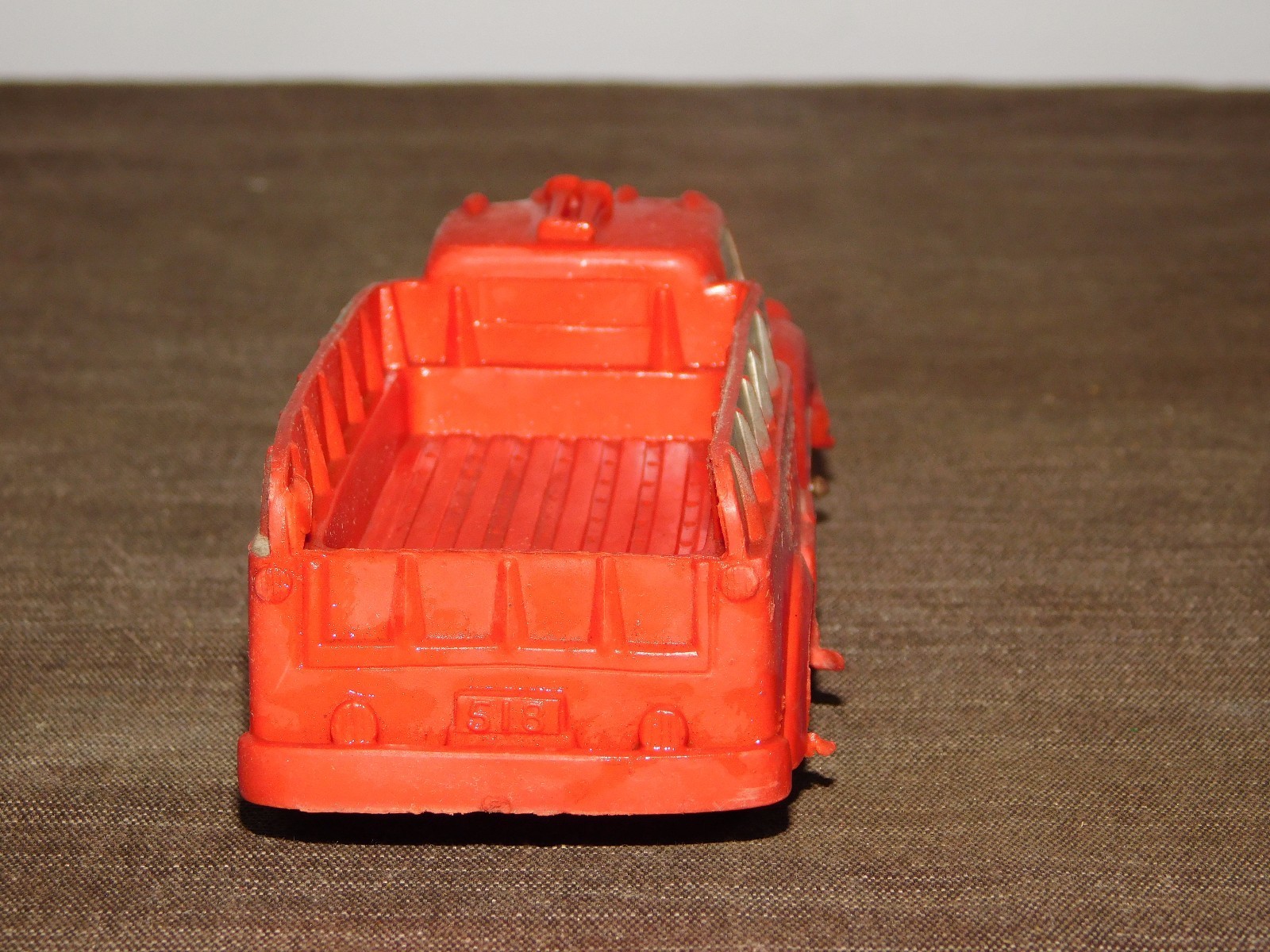 VINTAGE MADE IN USA TOY 5 1/2" LONG RUBBER PLASTIC AUBURN RED TRUCK