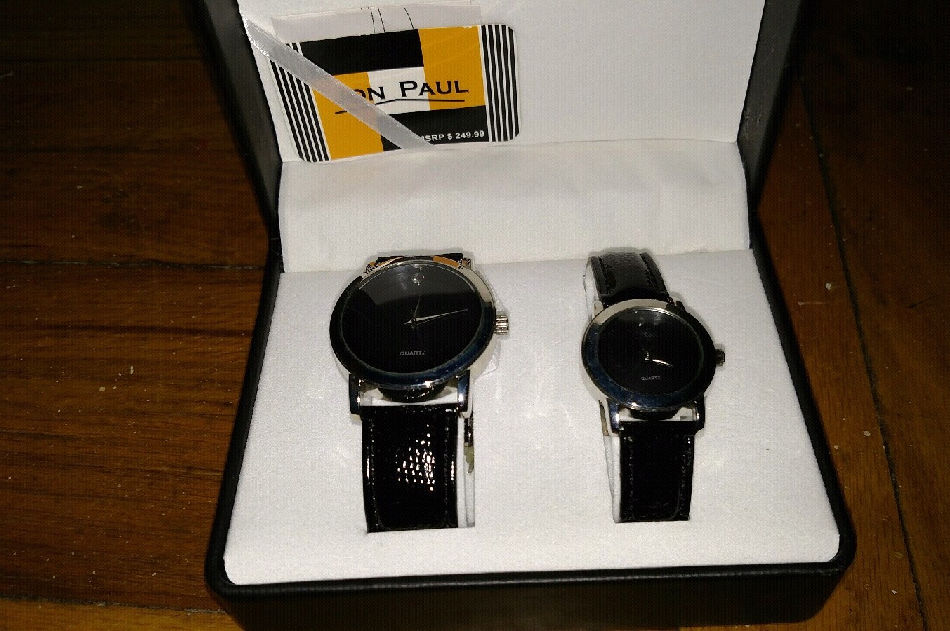Harrah's casino resort Jon Paul his hers new watches retails $249.99 watch w/box