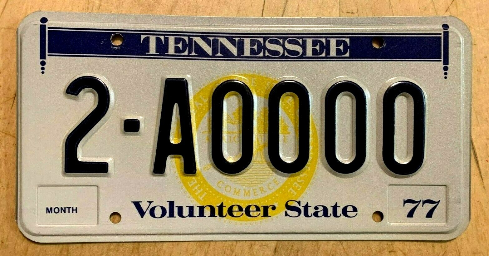 1977 TENNESSEE GRAPHIC SEAL VOLUNTEER STATE SAMPLE LICENSE PLATE " 2 A0000 " TN