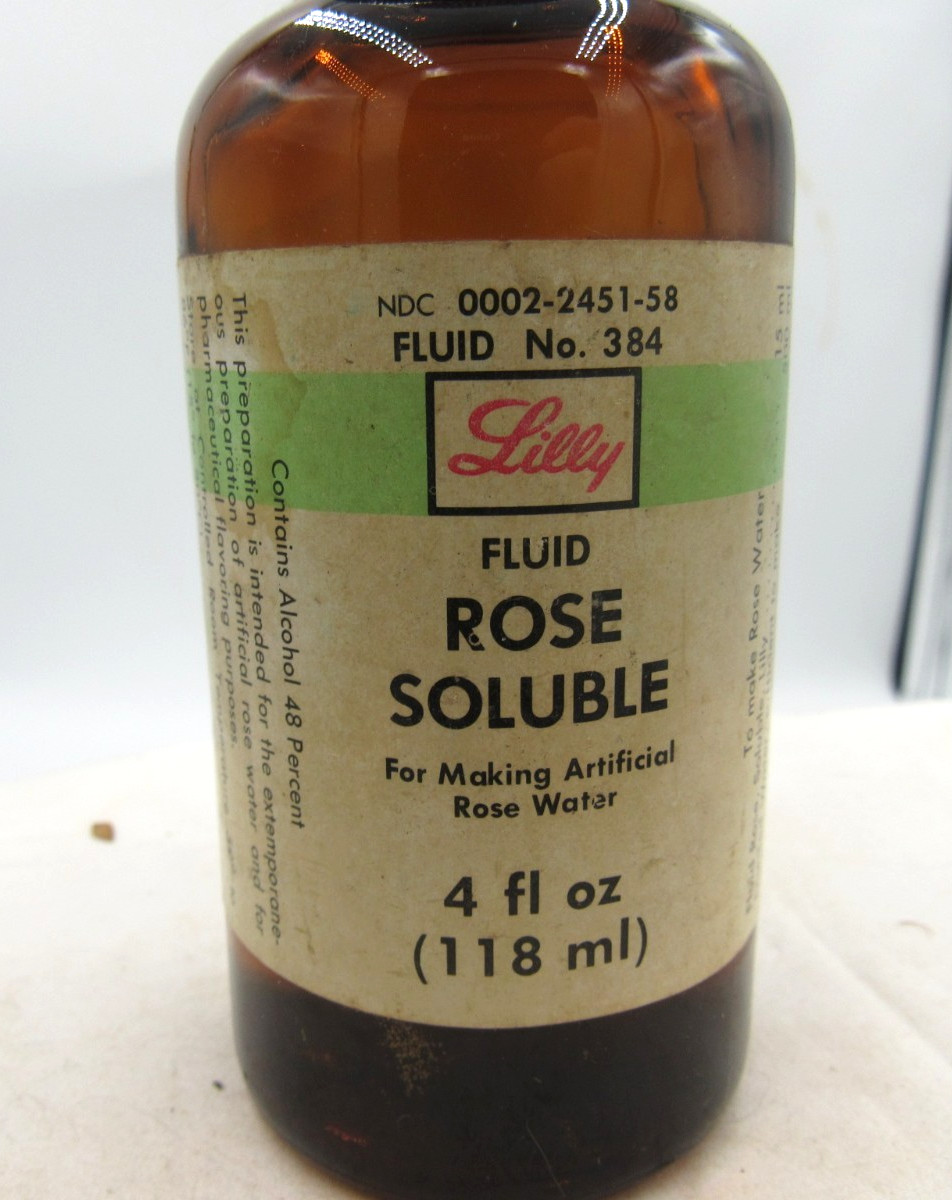 MM - 1980's Eli Lilly Rose Soluble Indianapolis Ind 4 7/8" Amber Medicine bottle