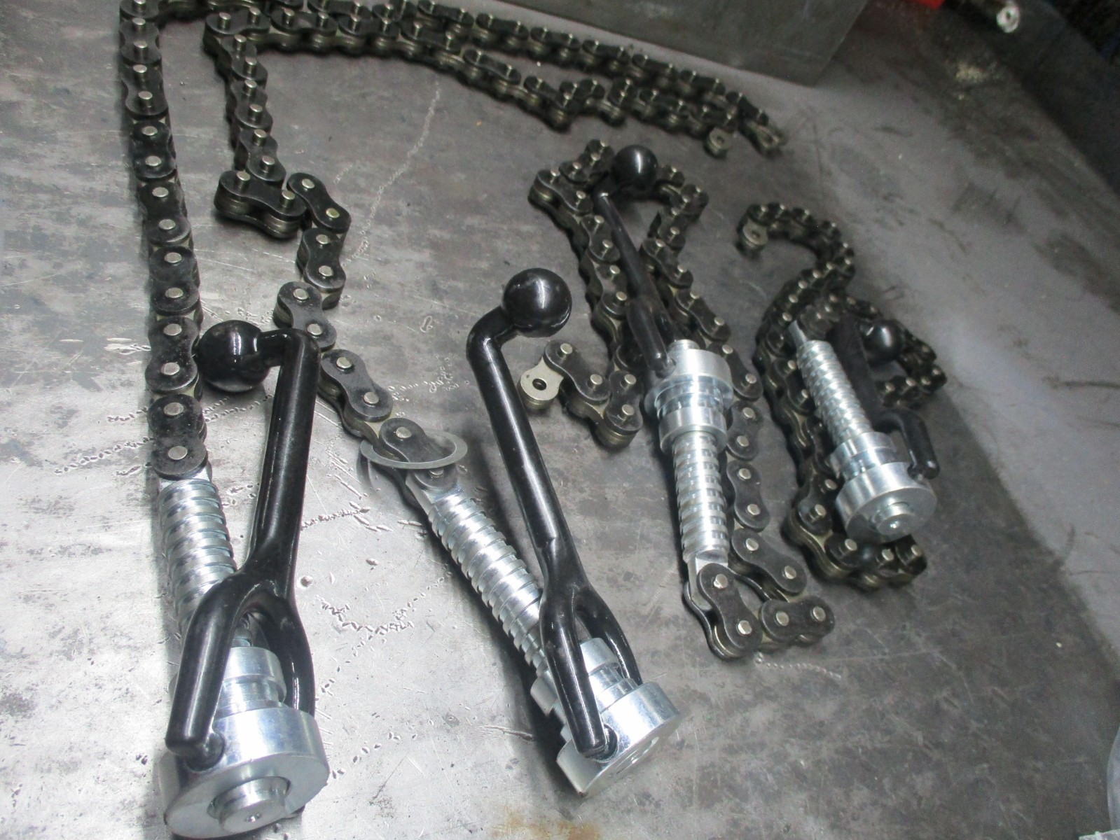 2 GREENLEE TUGGER TIE DOWN CHAINS