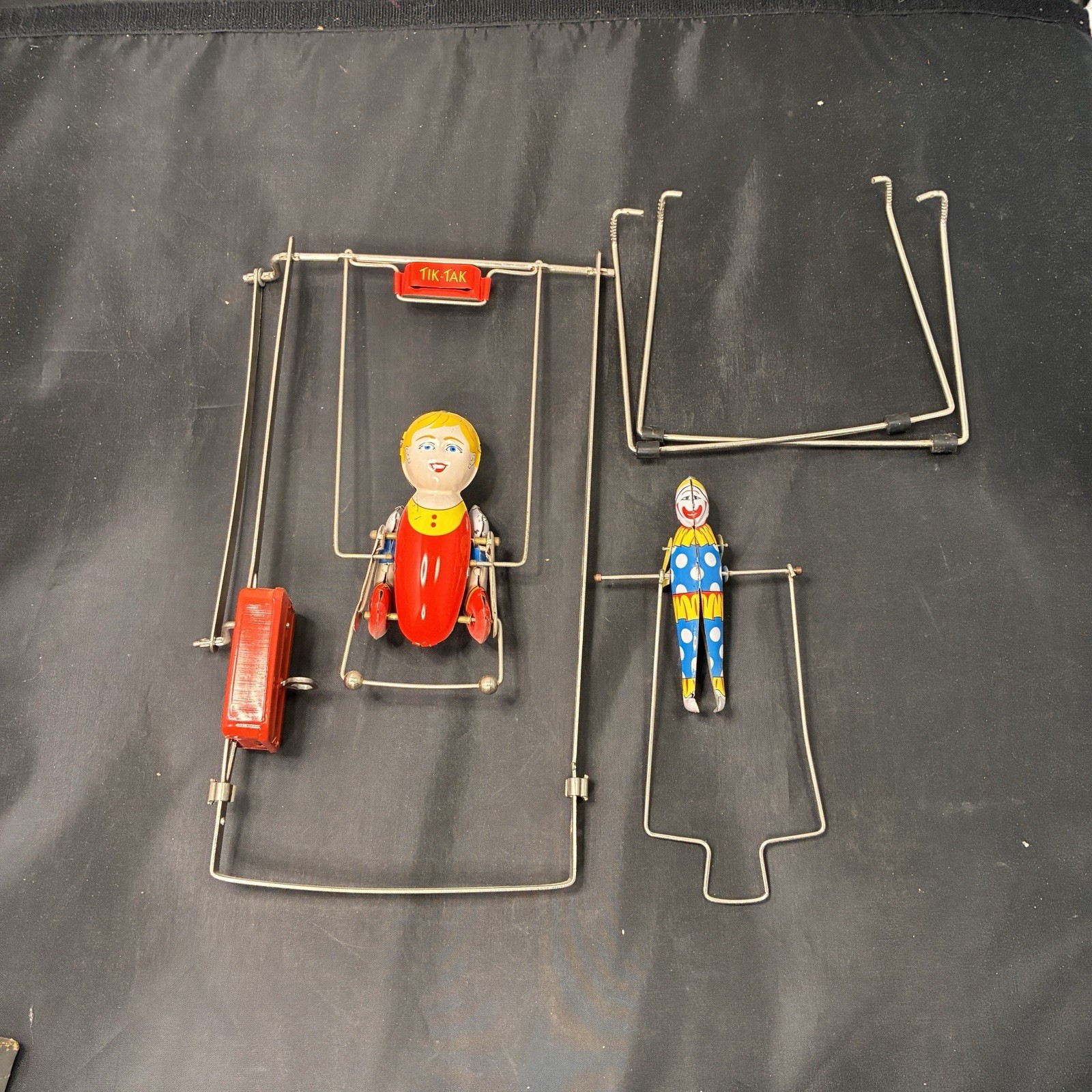 SCHYLLING TIN WIND UP TIK TAK ACROBOAT TOY