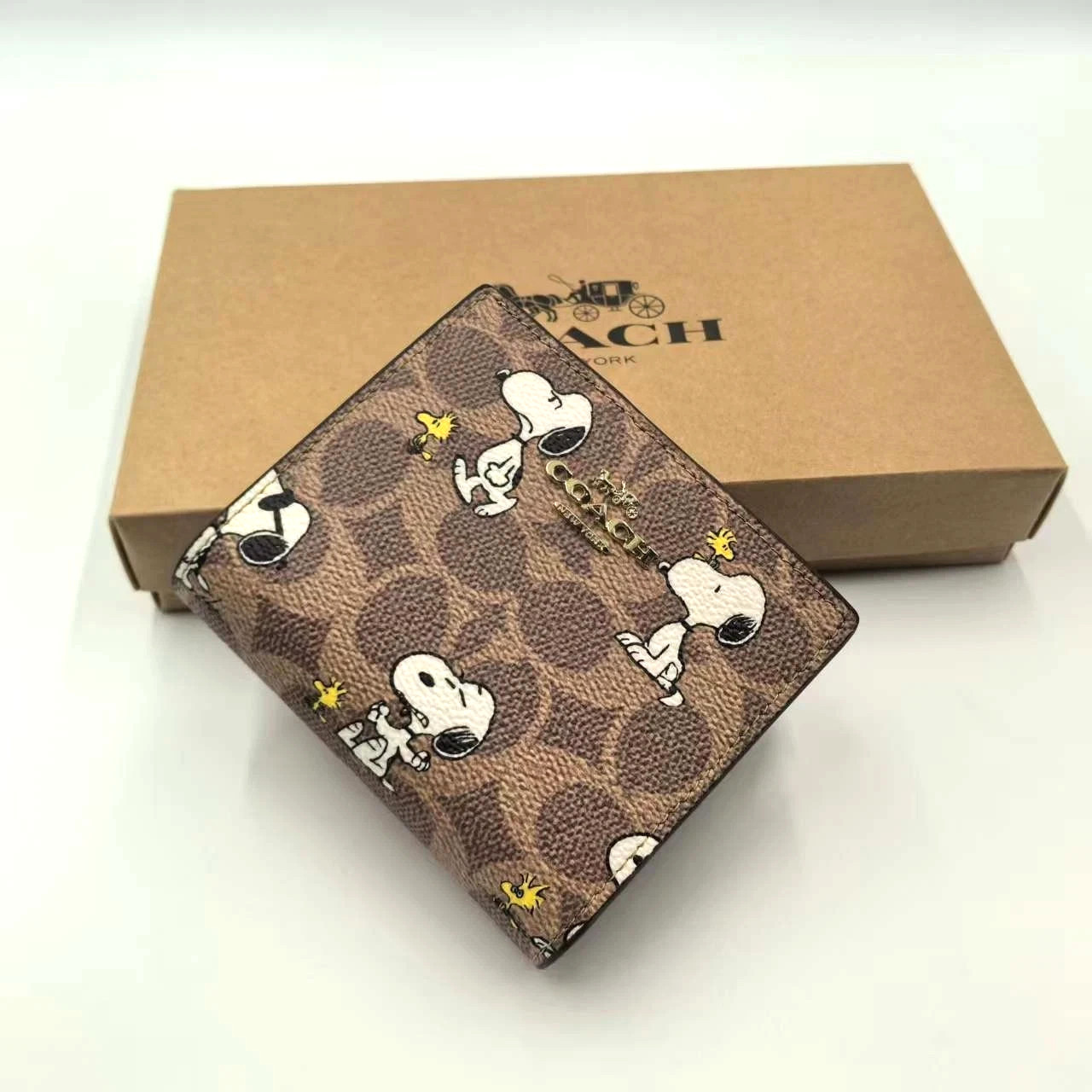 Coach X Peanuts Snap Wallet In Signature Canvas With Snoopy Print CBN32