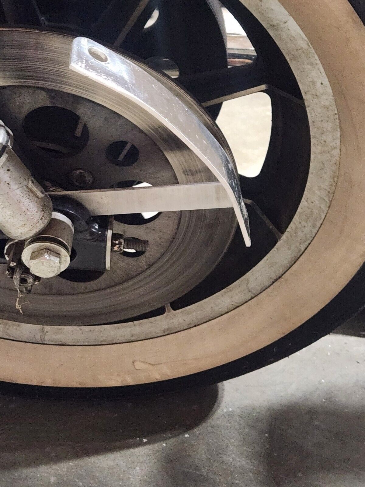 Curved License Plate Relocation Bracket for HARLEY DAVIDSON SPORTSTER All Years