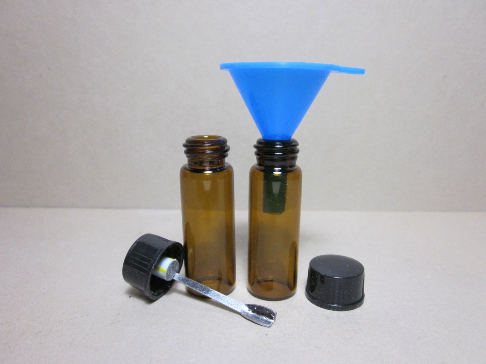 Two Pocket Vials for Sweetener/Spice One Cap with Shovel Spoon & a Blue Funnel