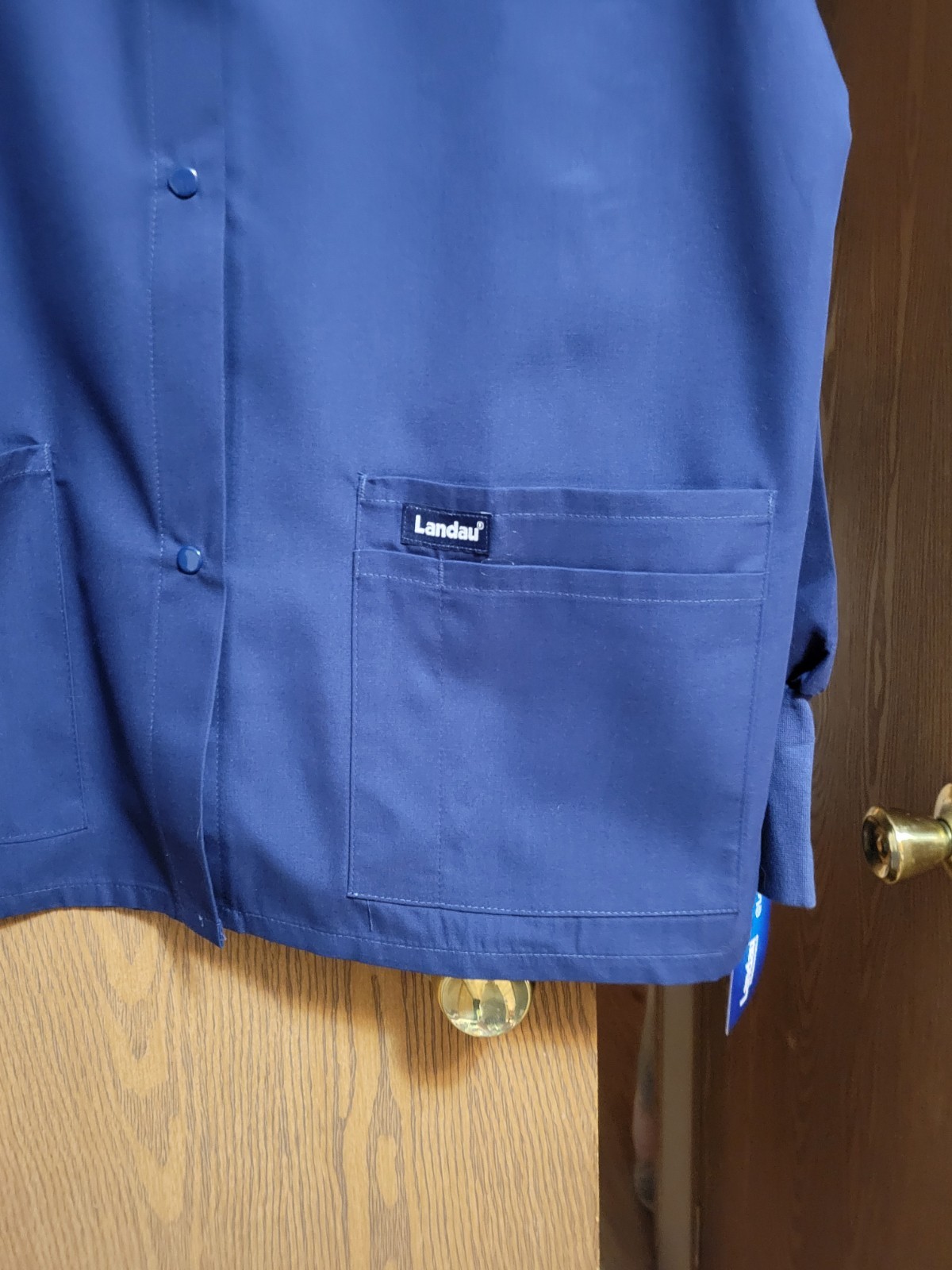 NWT. Med Unisex Long Sleeve Scrub Top/Jacket By Landau. Measurements Posted.