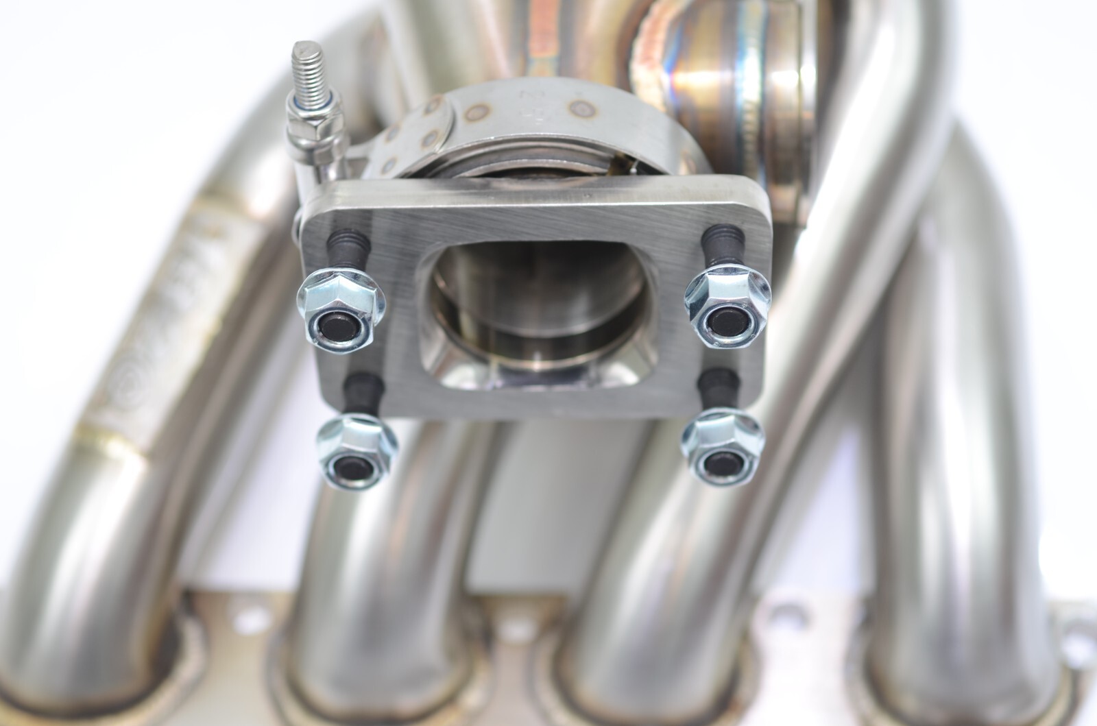 All Out Fab Precision turbo v-band to T3 adapter with hardware and clamp