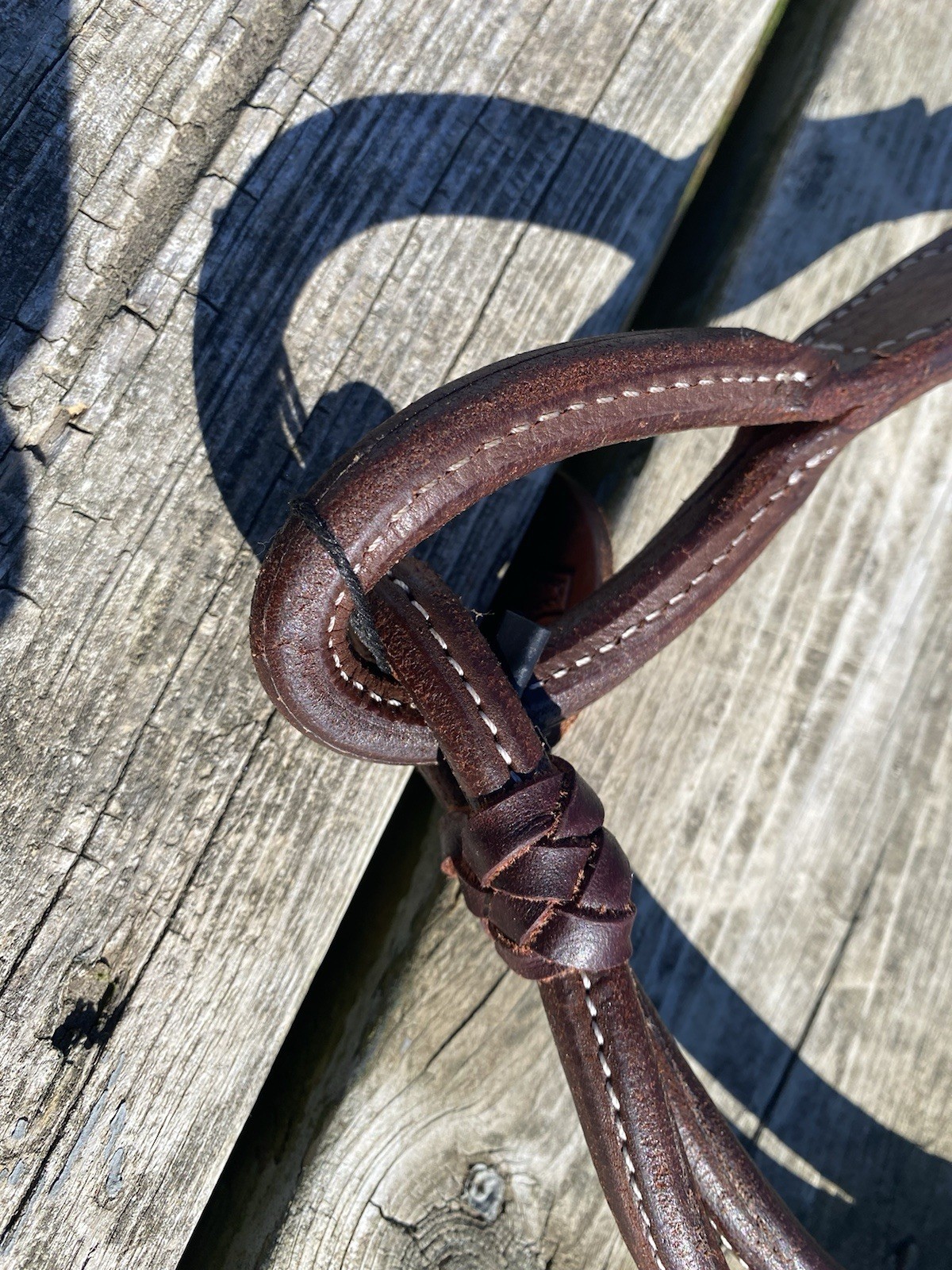 Rolled Argentine leather quick change Romel reins w/braided rawhide accents