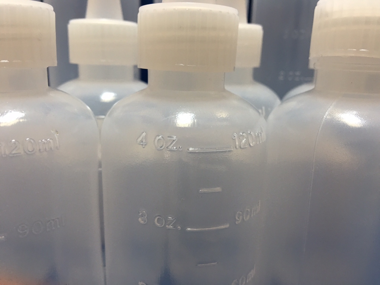 12 pack of 4oz (120mL) Plastic Boston Round Squeeze Bottles + Yorker Caps LDPE