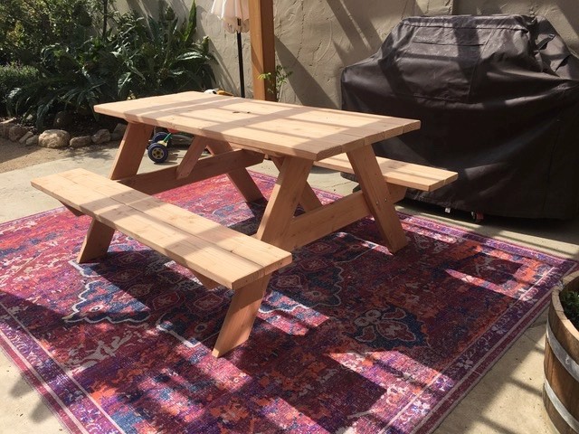 Picnic table made from Douglas Fir wood 6ft with attached benches. Custom made.