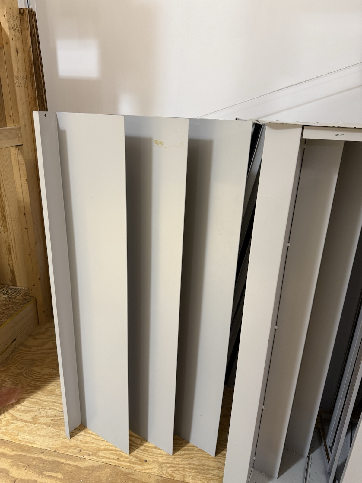 HUGE lot of pallets of Used Lozier Shelving shelves, components, glass cases