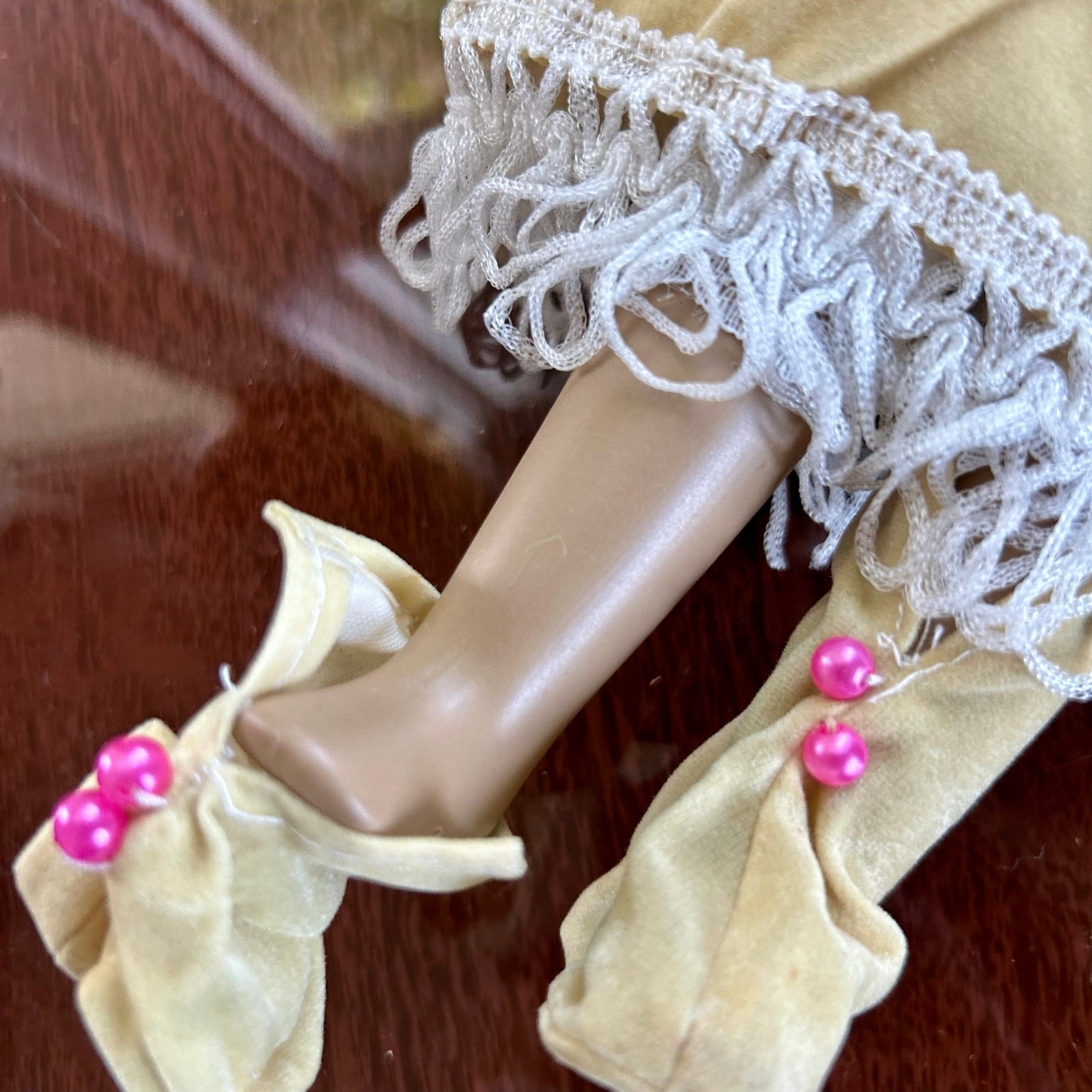 Vintage Porcelain Native American-Inspired Doll with Braids and Beaded Outfit