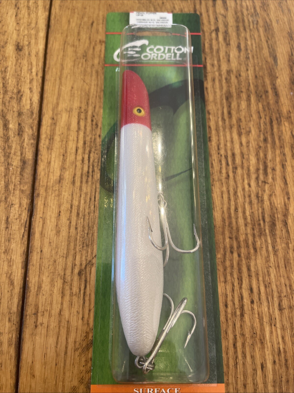 Cotton Cordell Pencil Popper Topwater Lure 7", 2 oz Pearl Red Head C8728