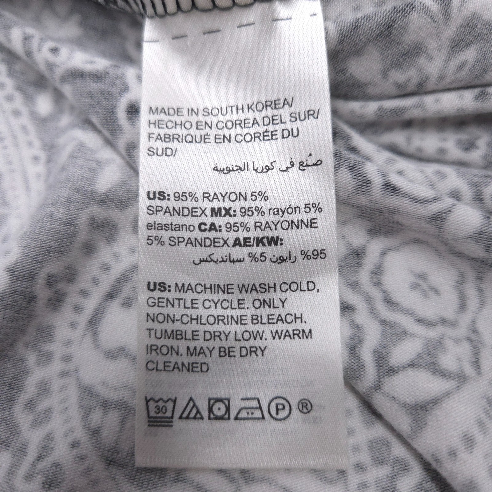 Chico's stretch knit midi skirt Size 0 (S) paisley black/white shark hem pull-on