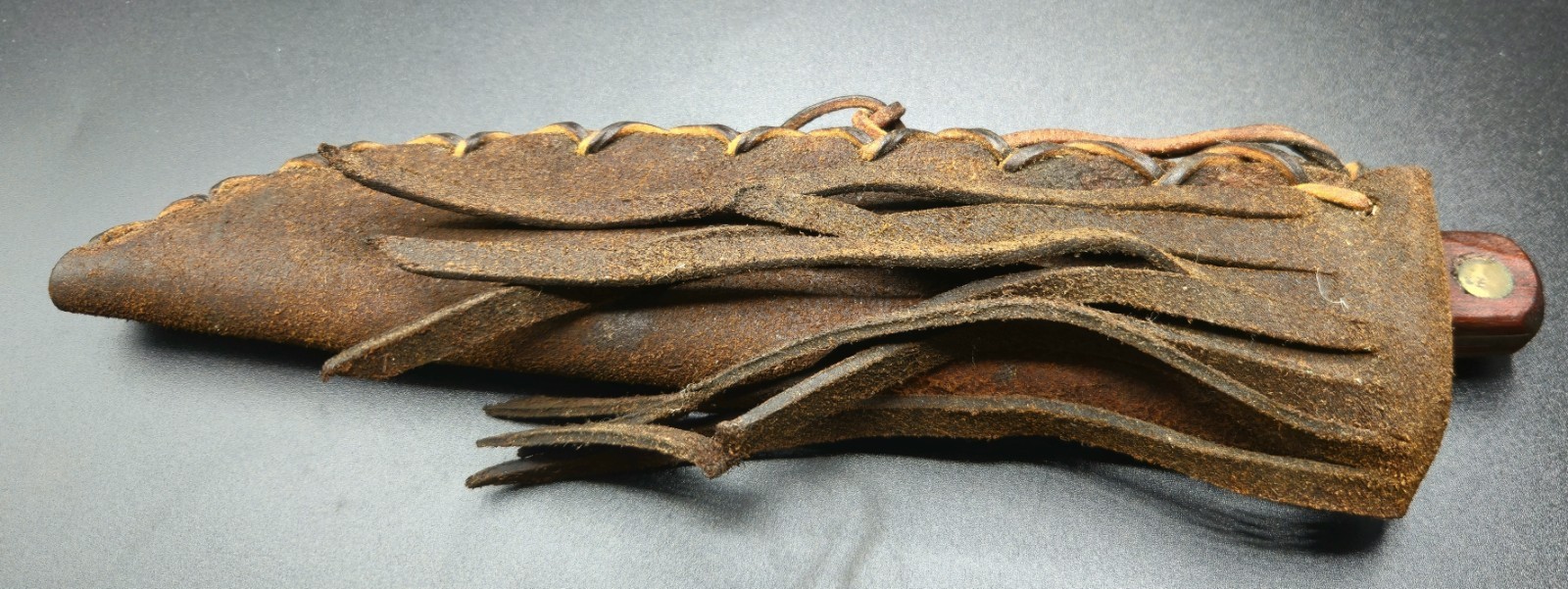 Vintage Trade Knife collectible with leather fringe sheath