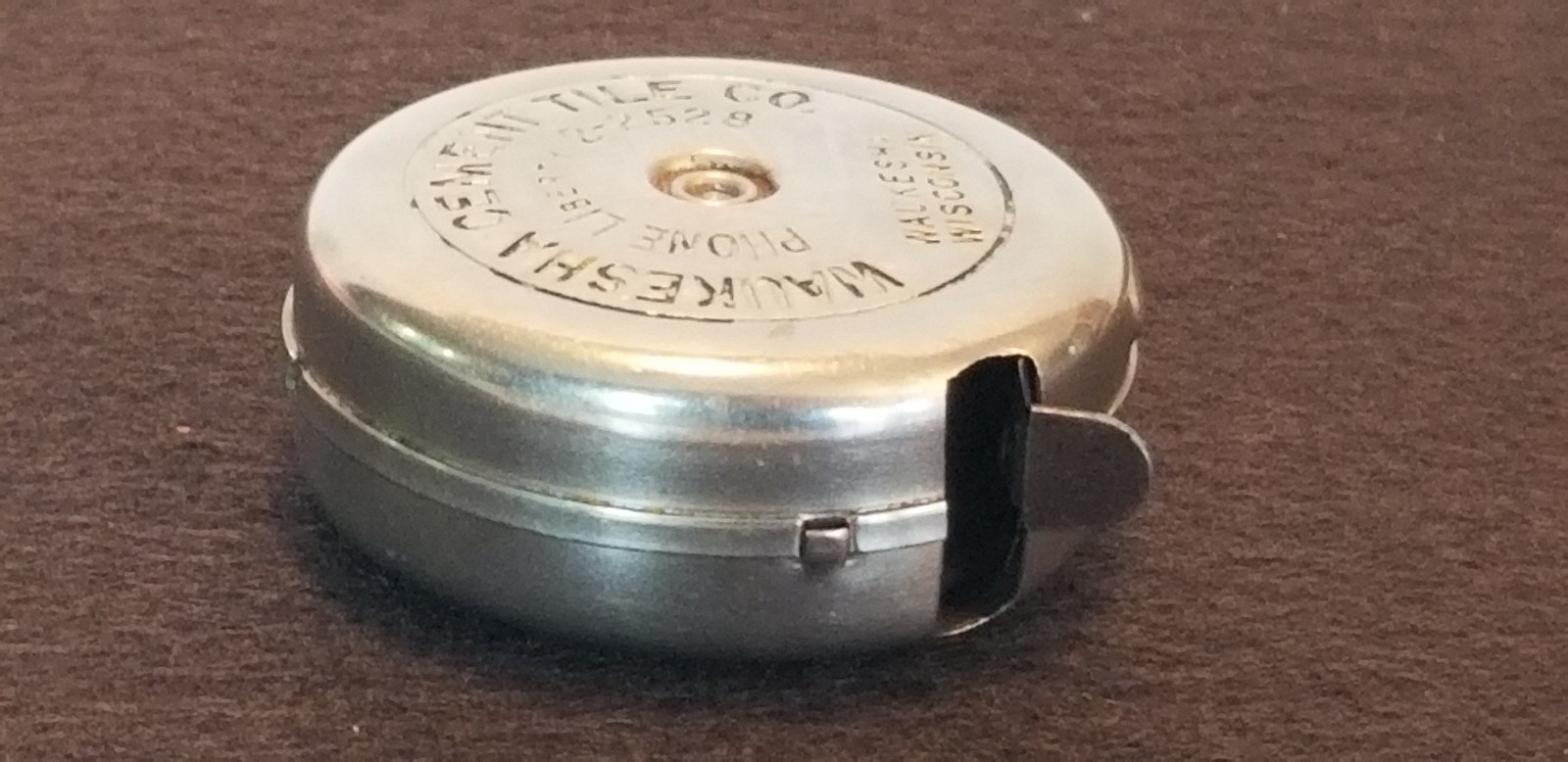 Vintage 1930s Lufkin Round Waukesha Cement And Tile Co. 6ft Tape Measure