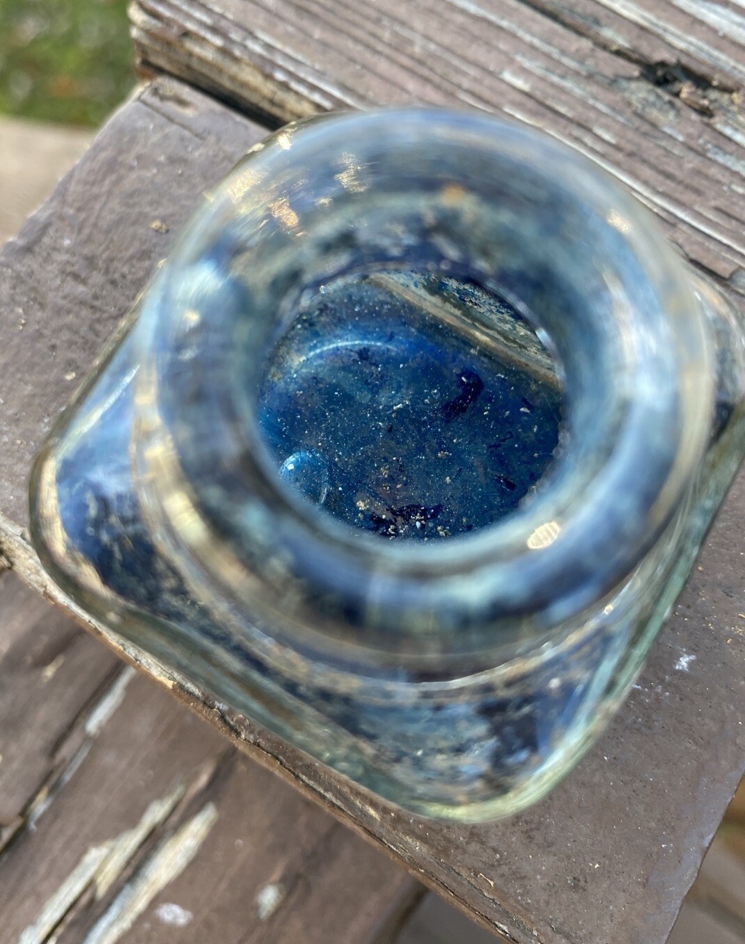 Clear Inkwell With Blue Ink And Partial Label