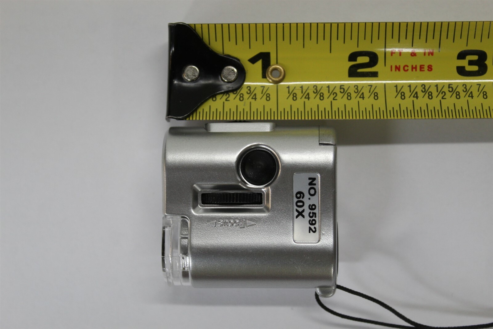 CKStamps: 60X Pocket Mini Magnifier Microscope Loop w/LED UV Light(Color:Silver