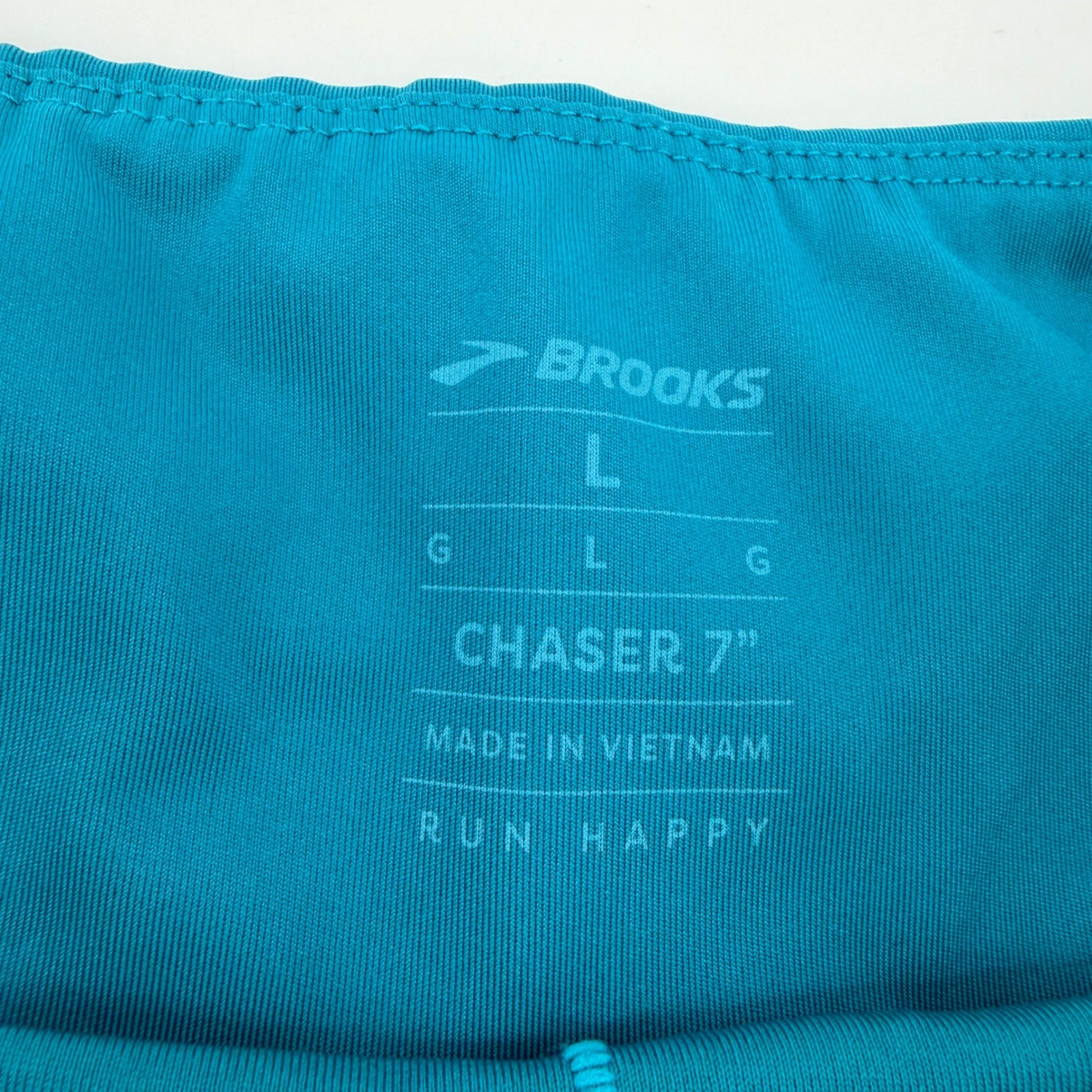Brooks Chaser 7" Running Shorts Teal Splatter Women Size L Confetti Print