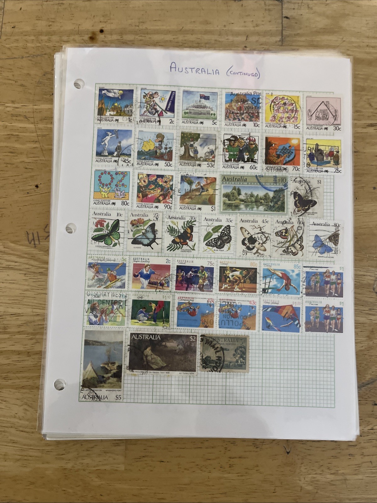 Lot of new and used stamps from all over the world. ON Paper.