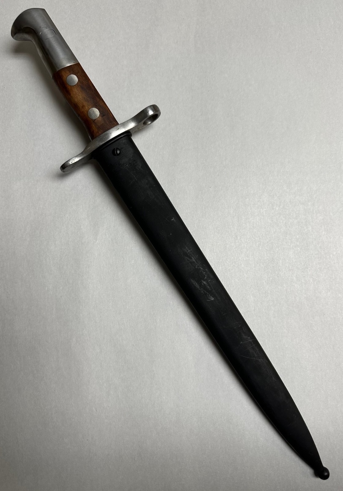 SWISS K31 BAYONET WITH SCABBARD. NEW OLD STOCK.