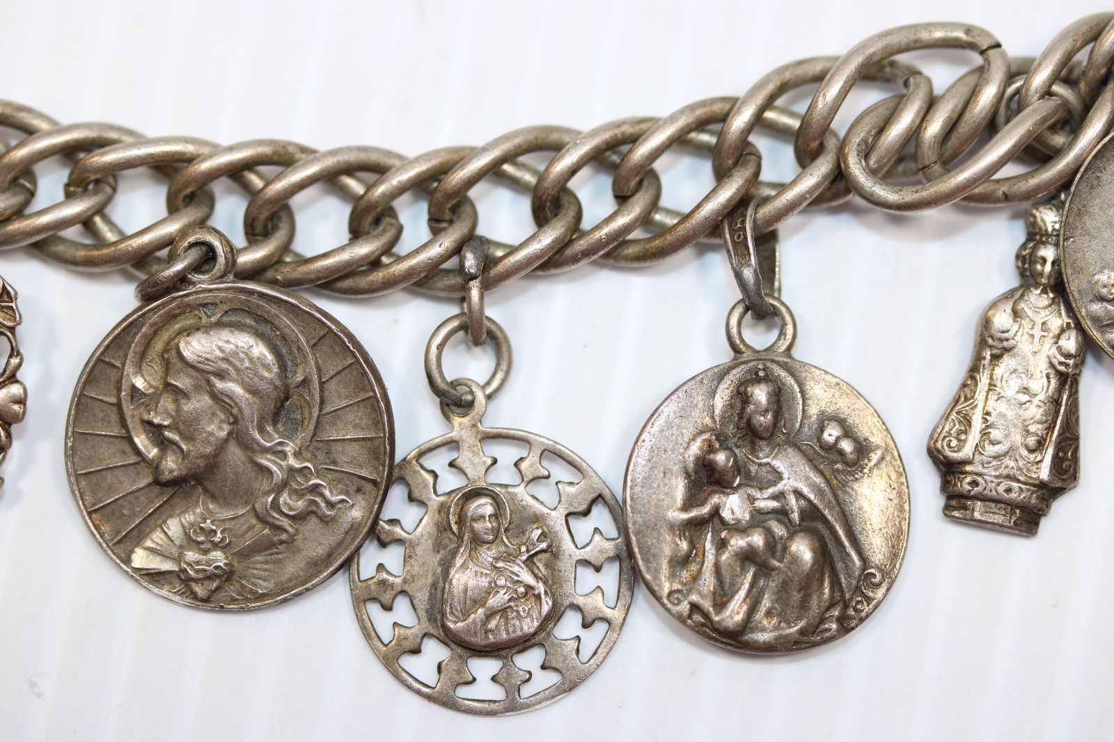 Vintage Sterling Silver Saint Charm Bracelet featuring 13 Medals 60g #450