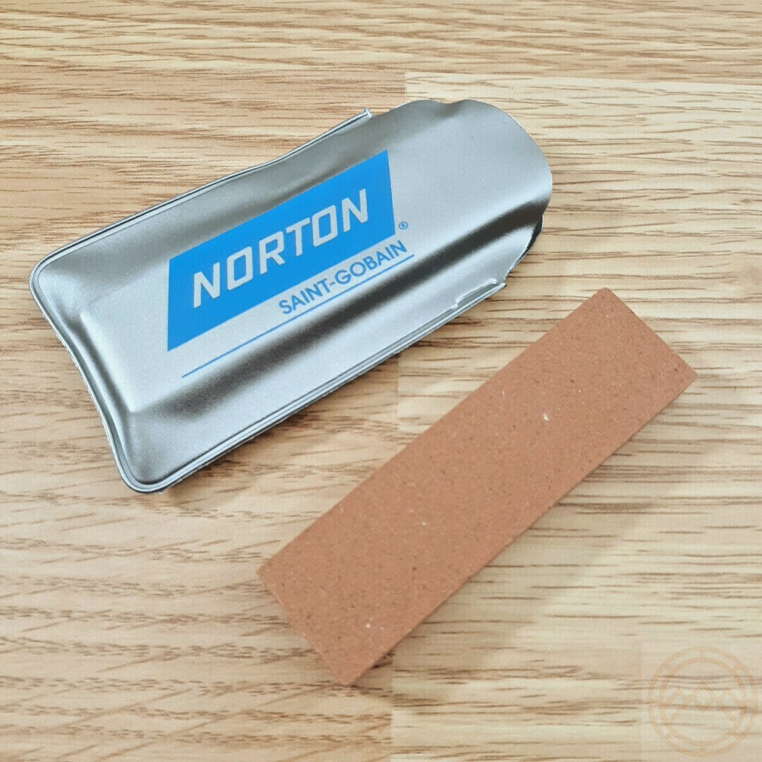 Norton Small Sportsman Fine Grit Pocket Stone Measures 3" x 7/8" x 3/8" Orange