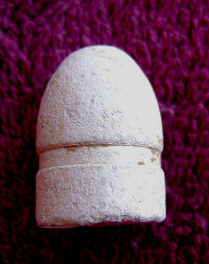 RARE .69 CALIBER FRENCH TRIANGLE CAVITY BULLET WITH TALL BASE (SHILOH)