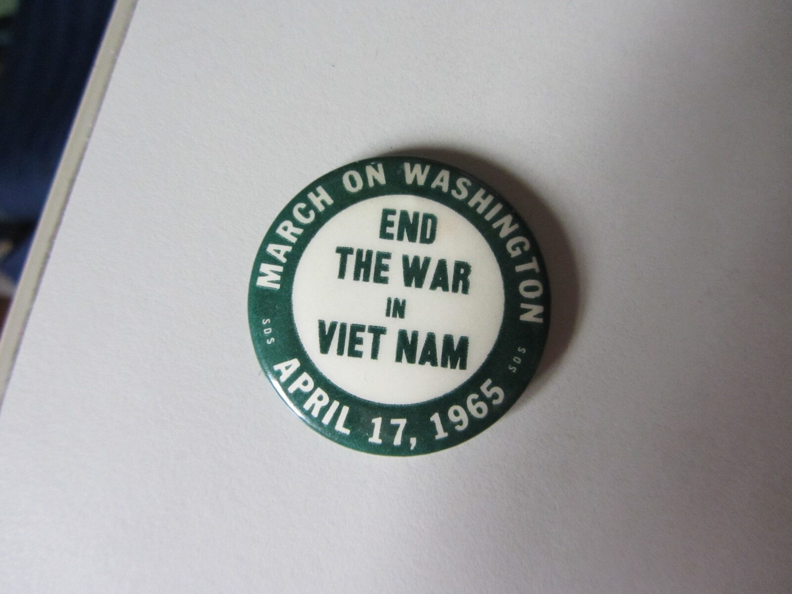 "End the War in Viet Nam" pinback button March on Washington April 17, 1965 SDS