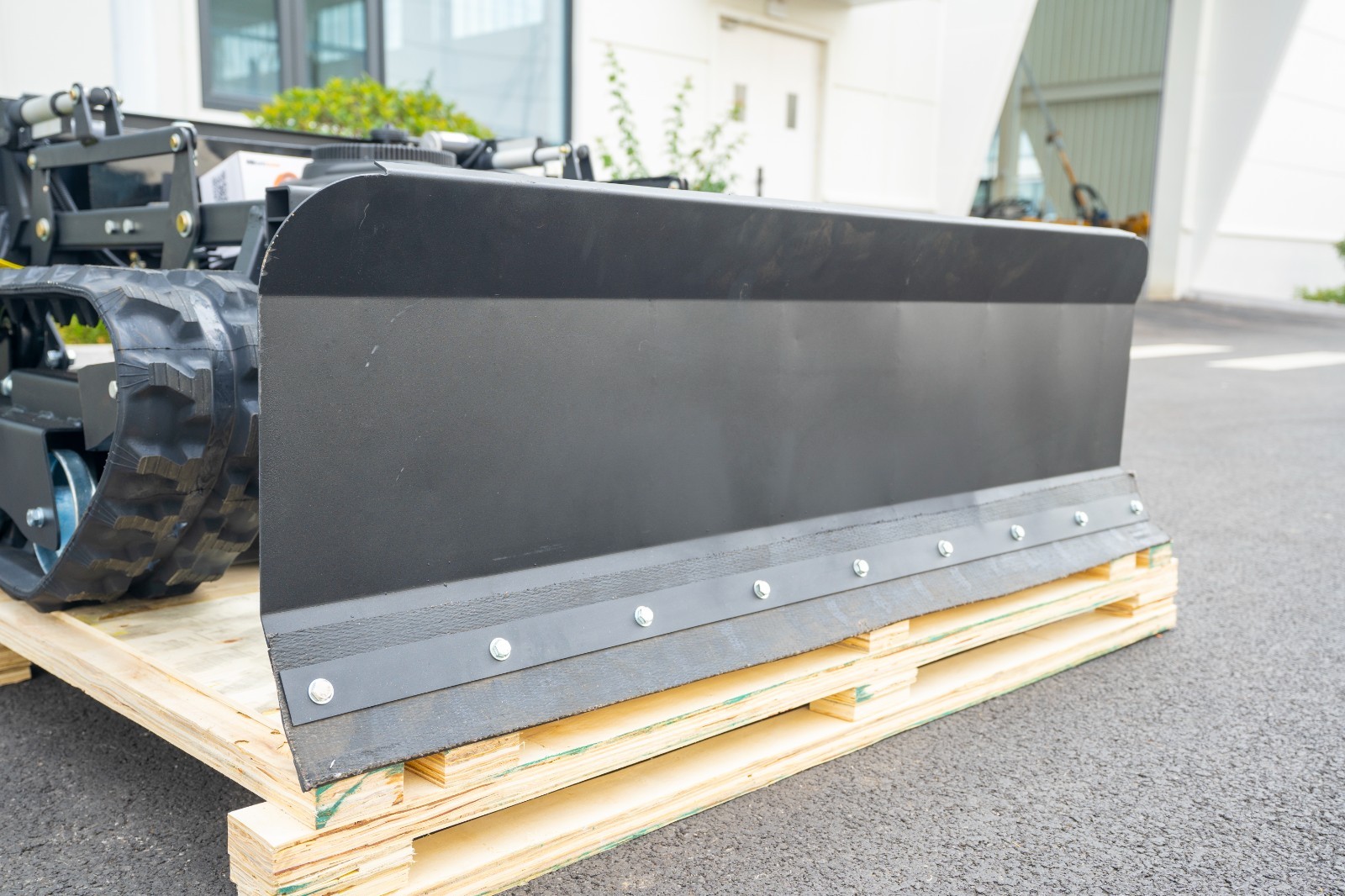 Remote-controlled lawnmower with snowplow for a limited time, available for snow