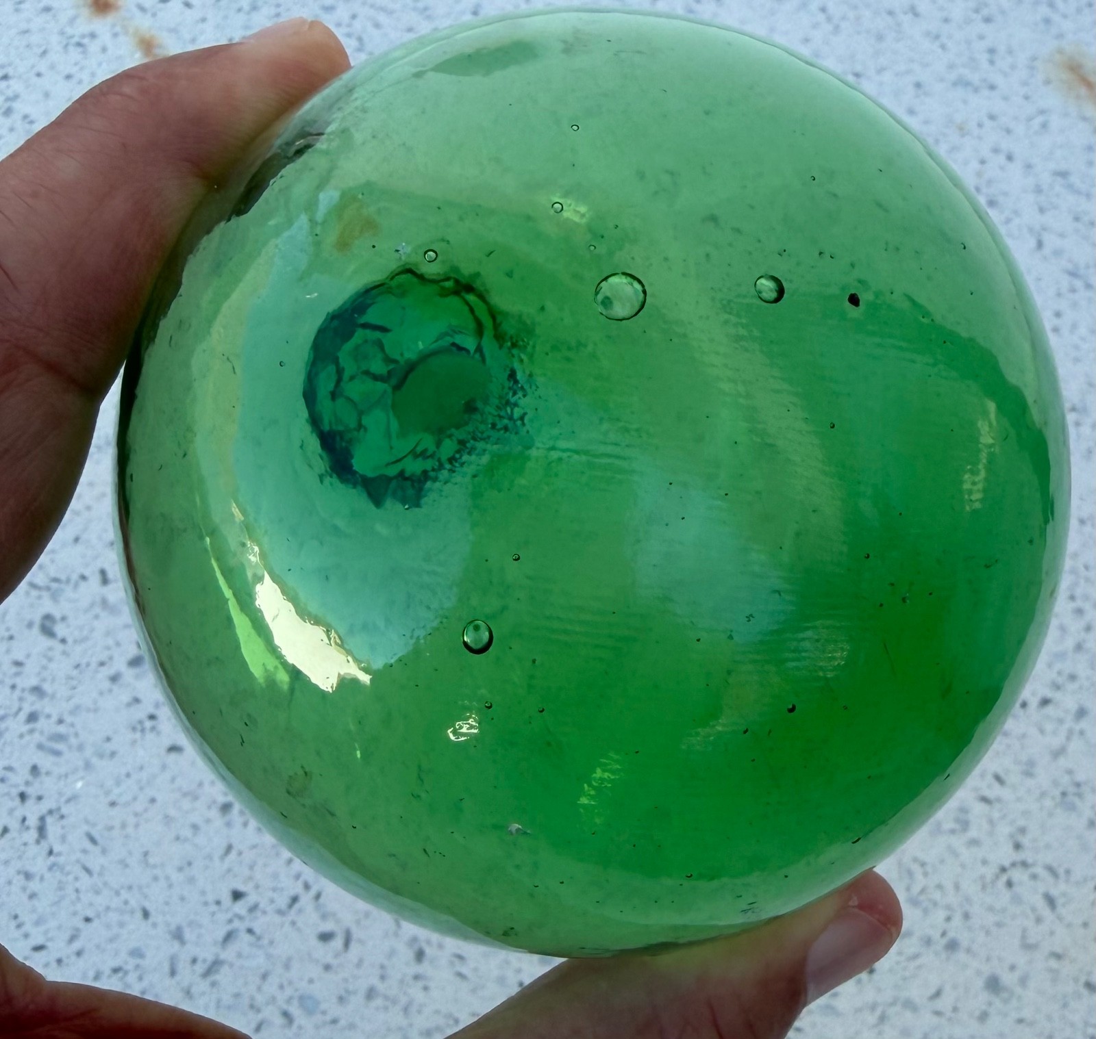 Glass fishing float marked G.P.