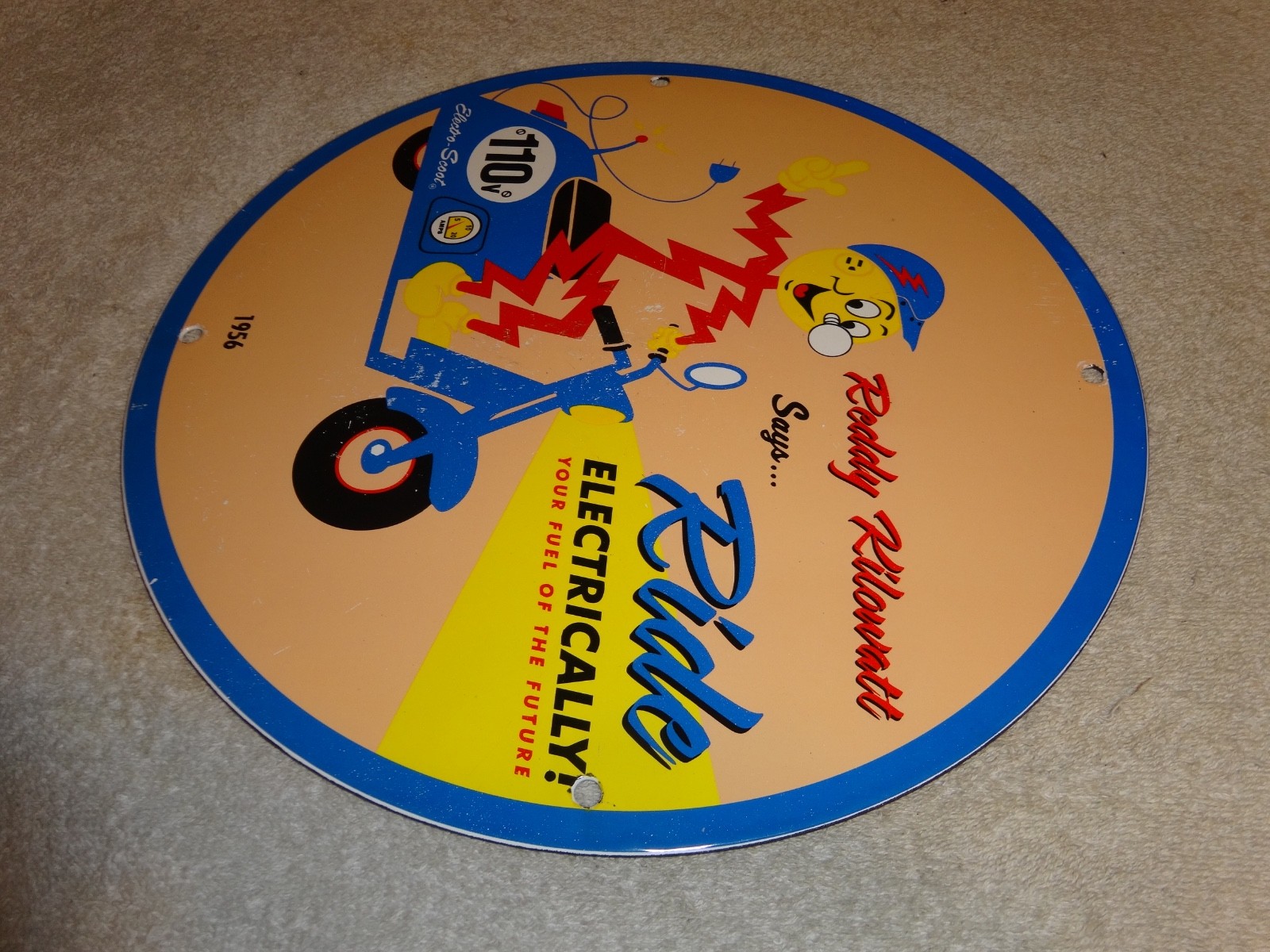VINTAGE 56 REDDY KILOWATT ELECTRIC SCOOTER 11 3/4" PORCELAIN METAL GASOLINE SIGN